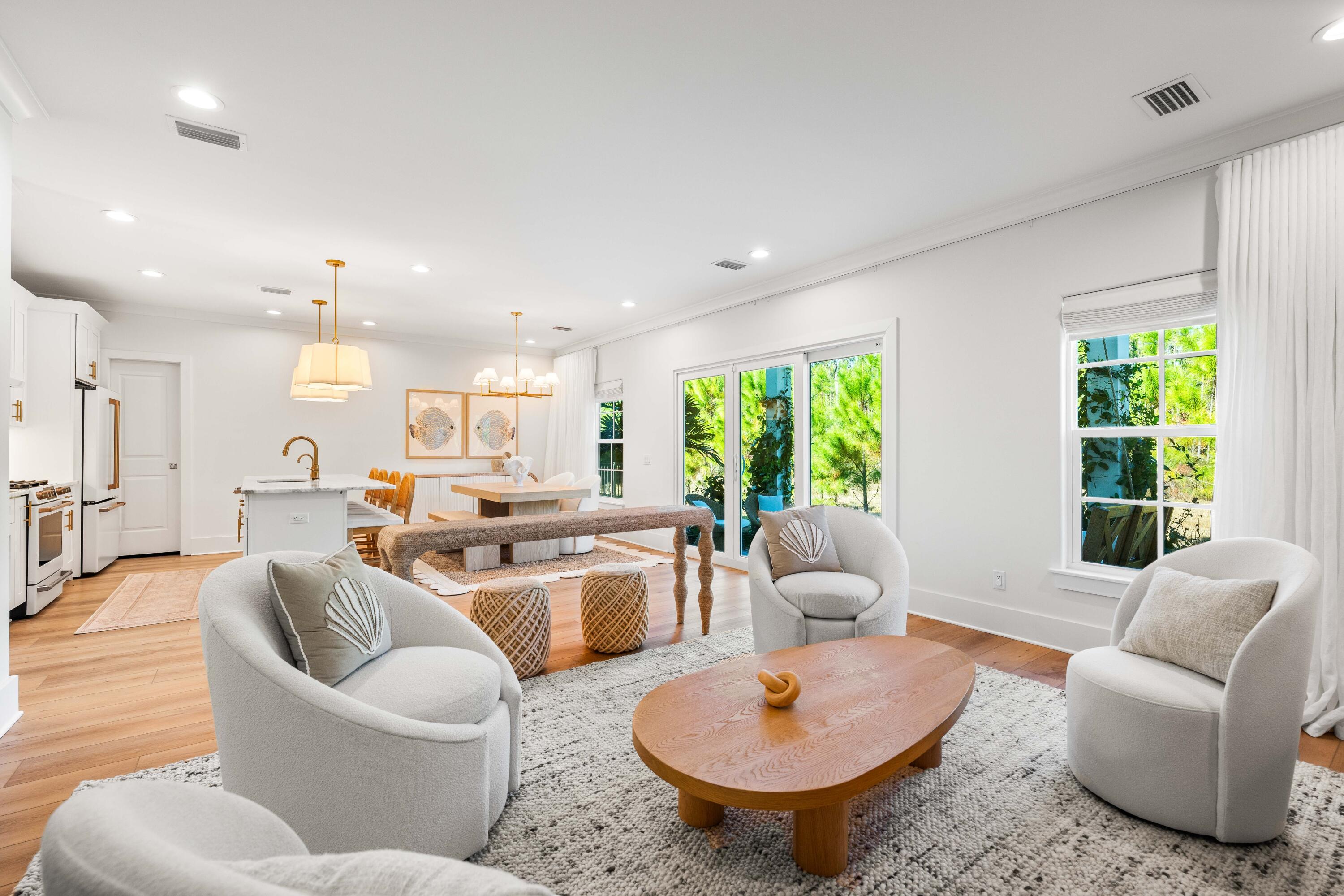 Coastal living meets modern elegance at this nearly new home perfectly situated south of Highway 98, offering convenient access to 30A's renowned beaches, upscale shopping, and dining. Designed by one of the premier builders on 30A, this 4-bedroom, 3.5-bathroom home beautifully blends thoughtful craftsmanship with functional design. Step into the open floor plan, where upgraded lighting fixtures and stainless-steel appliances, gold fixtures and marble countertops elevate the gourmet kitchen. Honey-toned wide plank wood floors and white walls create a soothing sanctuary throughout the home. The open living and dining areas are bathed in natural light and open to a covered patio overlooking the forest. The second-floor primary suite is a tranquil haven featuring a seamless glass shower with designer tile, while the first-floor guest suite boasts a private en-suite bathroom for added comfort. Two additional second-floor bedrooms share a bathroom. A one-car garage provides convenience and extra storage.
Sugar Sands Estates is a boutique community surrounded by lush State Preserve lands with both a community pool and clubhouse, perfect for leisurely afternoons. With no short-term rentals permitted, this neighborhood ensures a serene and private atmosphere, allowing for leases of six months or longer. Don't miss this opportunity!