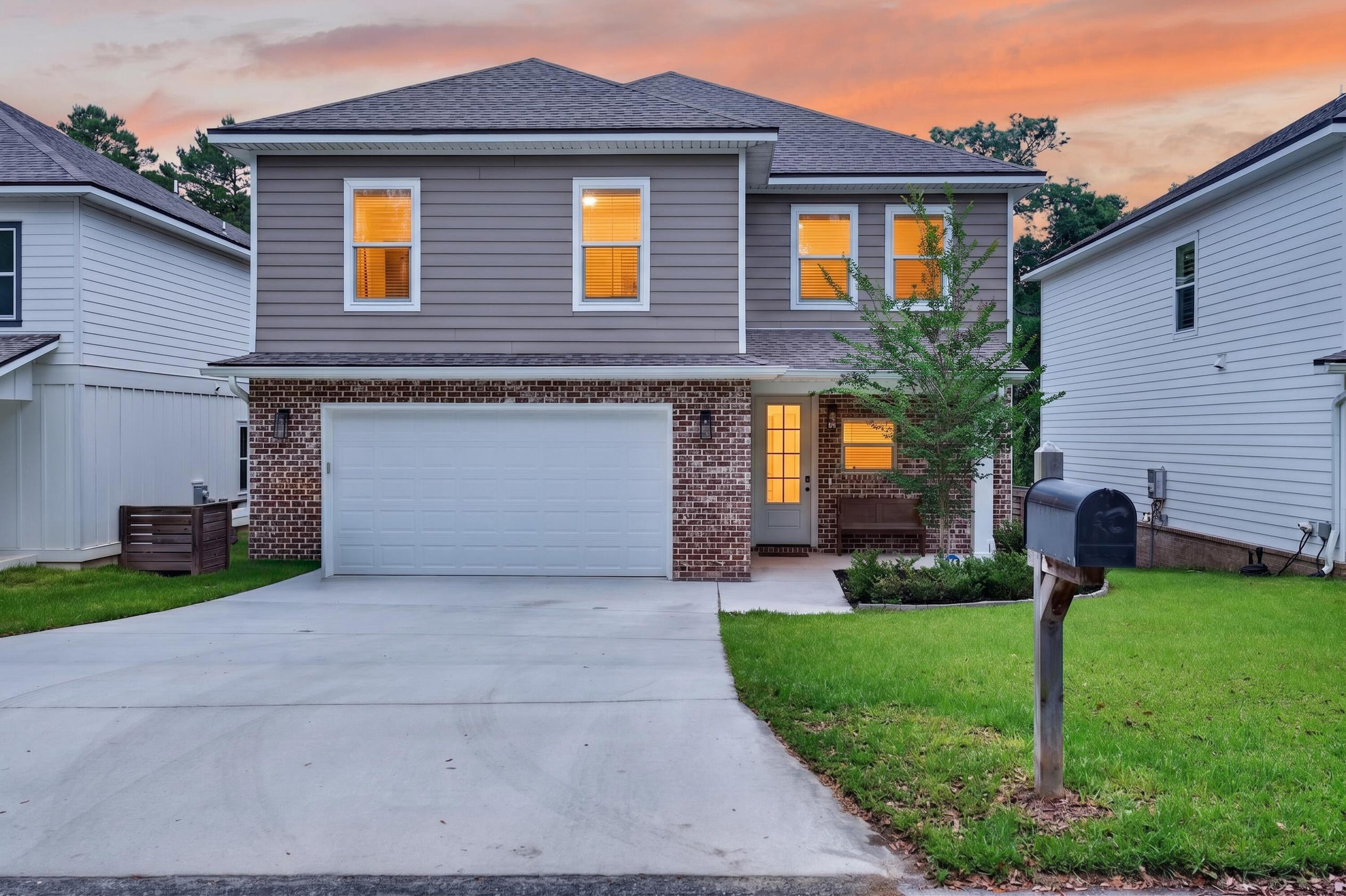 Tucked away on a quiet dead-end street in the heart of Niceville, this stunning 4-bedroom, 2.5-bath home offers the perfect blend of privacy, style, and convenience. Thoughtfully upgraded throughout, the exterior features an impressive 8-foot front door, brick accents, and durable thick PVC siding designed for low-maintenance living. Inside, you'll find spacious bedrooms complete with walk-in closets and an inviting open-concept layout ideal for entertaining. The home boasts 9-foot ceilings throughout, an oversized 27.6 x 22.8 garage, and upgraded spray foam insulation in the roof for added energy efficiency. The beautifully designed kitchen is a standout feature with custom white cabinetry, soft-close drawers, quartz countertops, an upgraded sink, gas stove, and a large walk-in pantry.  Additional upgrades include stylish lighting, a convenient floor outlet in the family room, and a fully remodeled oversized pantry with custom-built floating shelves crafted by a carpenter. Step outside and enjoy the custom paver patio, complete with a gas fire pit and a gas hookup ready for your grill -- perfect for relaxing evenings or hosting guests year-round.