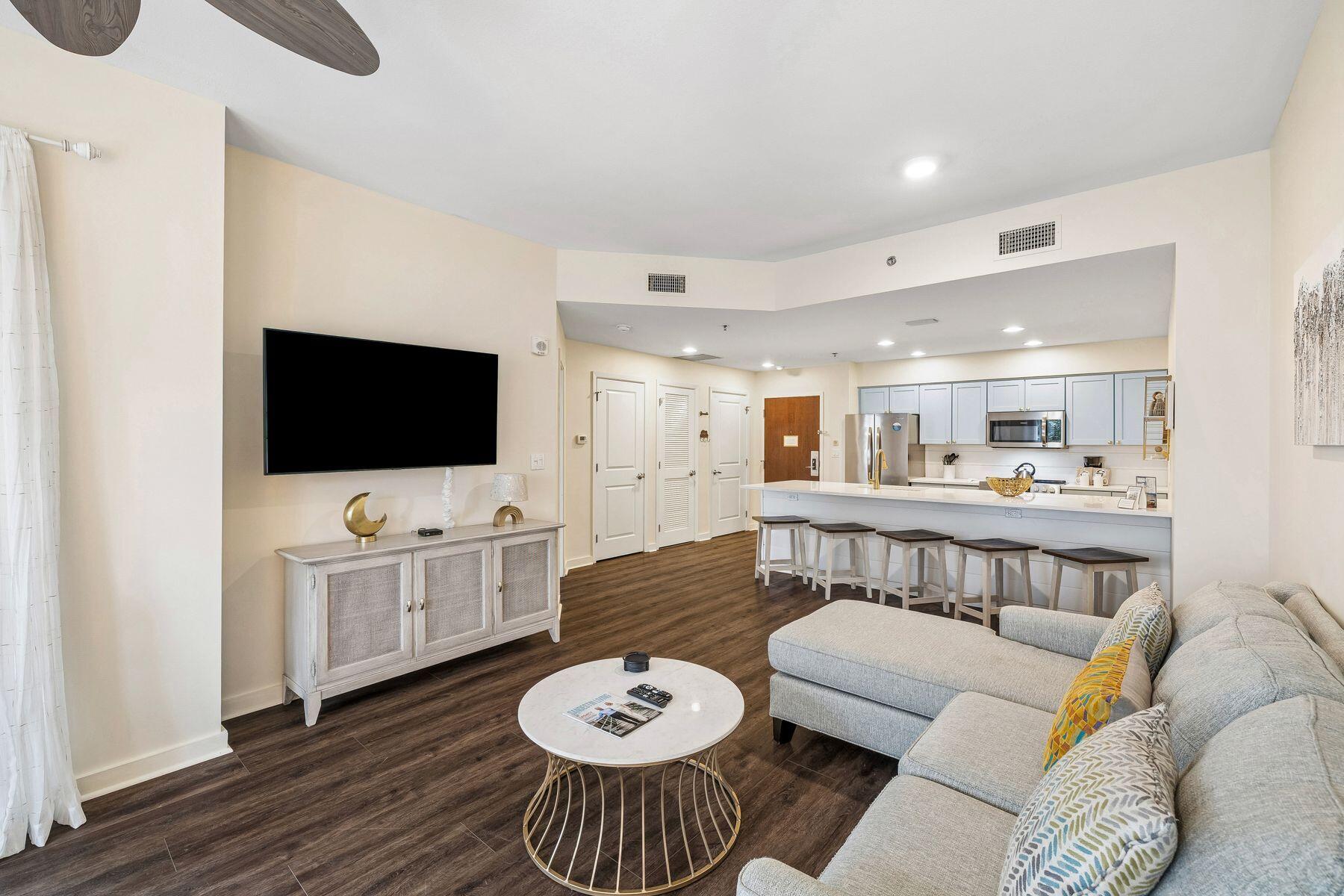 Beautifully renovated with coastal décor, this spacious first-floor 1-bedroom condominium offers the perfect combination of style, comfort, and convenience. The condo features soothing sea-blue cabinetry, crisp white quartz countertops, and sophisticated gray and gold accents, creating a bright, inviting space that perfectly complements the coastal lifestyle.Designed to comfortably accommodate up to four guests, it is ideal as a primary residence, vacation home, or income-producing rental investment.Luau owners and guests enjoy an exceptional collection of amenities, including a spectacular lagoon-style pool with a grotto waterfall, swaying palm trees, sun loungers, a seasonal tiki bar, fitness center, barbecue grilling area, covered garage parking and a private owner storage cage.Conveniently located on the first floor, you'll enjoy easy access to the resort's amenities with no need to wait for an elevator when heading to the lagoon-style pool or taking the private beach pathway to the sugar-white sands of the Gulf. All of this is located within the gates of the renowned Sandestin Golf & Beach Resort, offering an unmatched resort lifestyle with more than 2,400 acres of amenities. Residents and guests enjoy over seven miles of pristine beaches and bayfront shoreline, four championship golf courses, a world-class tennis and pickleball center, a full-service marina, miles of walking and biking trails, and the vibrant Village of Baytowne Wharf with its restaurants, shopping, entertainment, and year-round events. Grand Boulevard, located just outside the resort gates, offers additional premier shopping, dining, and entertainment.