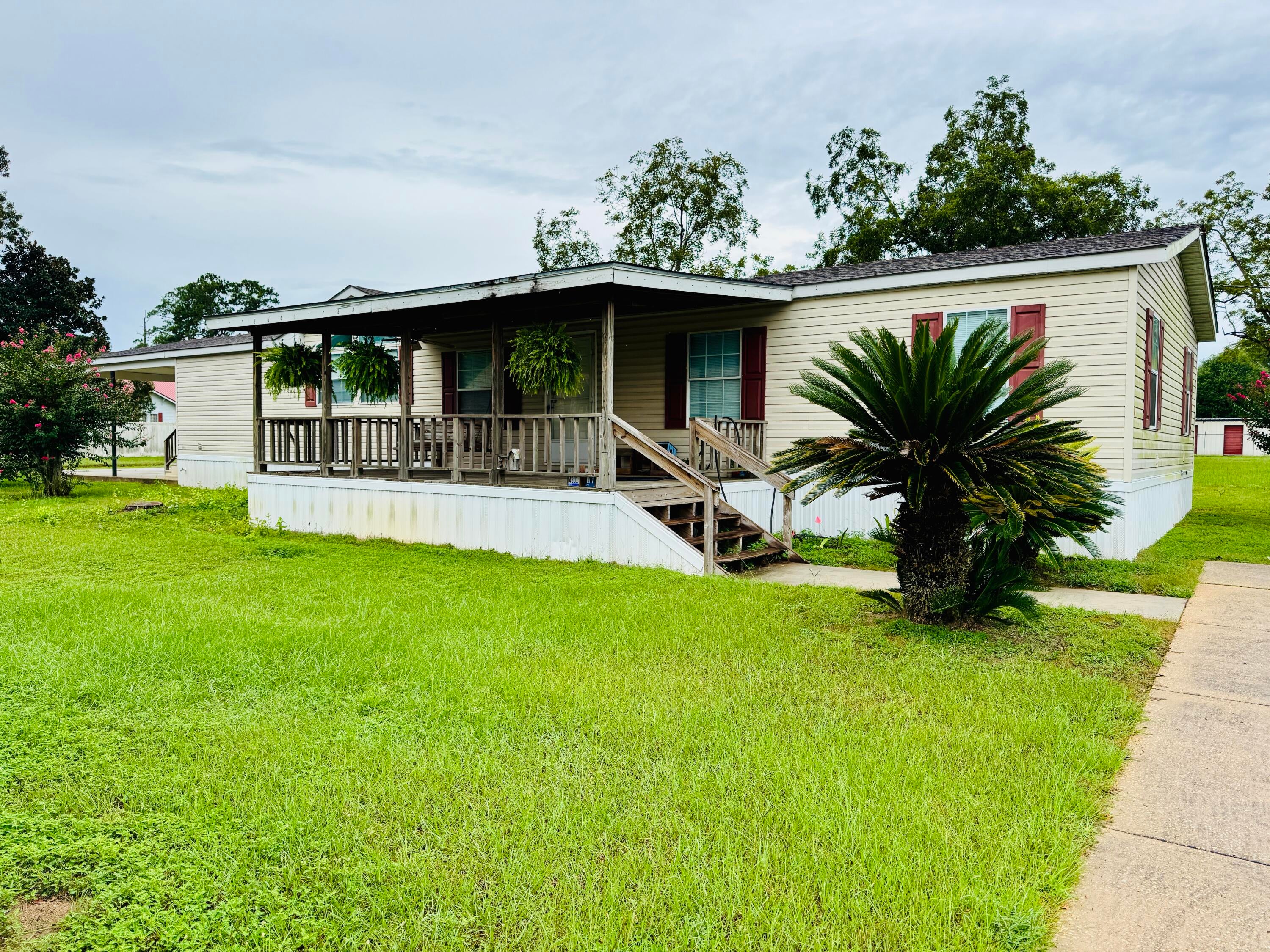 Charming 3-bedroom, 2-bath rental located just minutes from the serene shores of Lake Jackson in Florala. This residence features a versatile bonus room. The home boasts durable LVP flooring and sheetrock walls throughout for a clean, modern feel.

Enjoy the convenience of a covered front porch and a carport for protected parking. This property is offered partially furnished and the rent includes ALL utilities and lawn care--you only pay for cable and wifi.

No pets, no inoperable vehicles in the yard, no above ground pools, and no smoking/vaping in the home.
