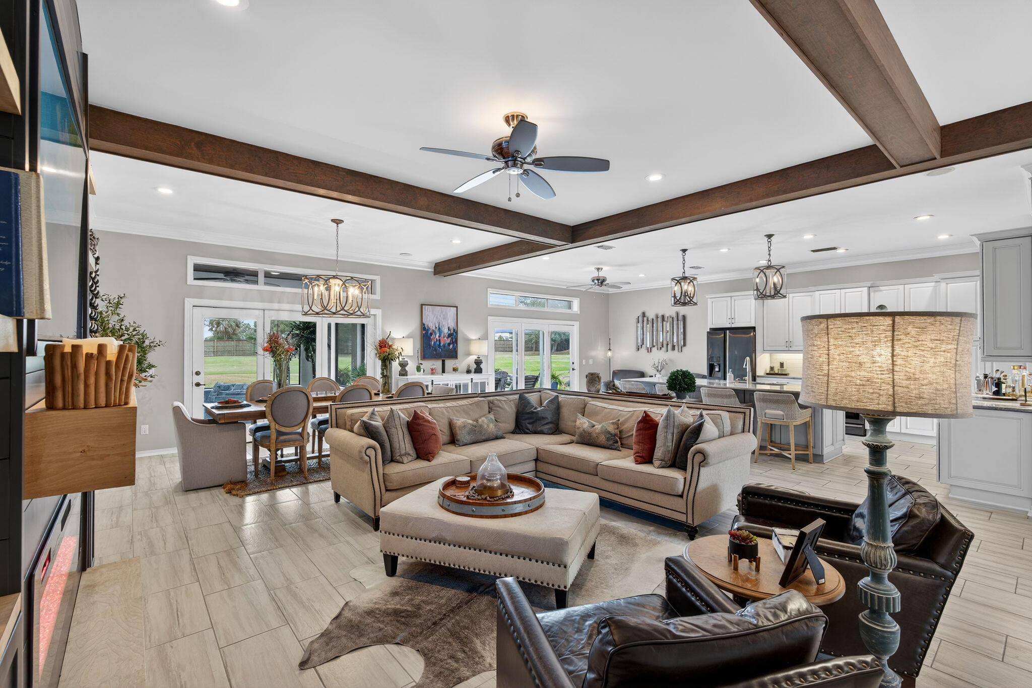 Perfect in every way!  This beautiful property has been professionally upgraded to the most current standards.  It is located on the 3rd hole of the historic Links Golf Course in the internationally acclaimed Sandestin Golf and Beach Resort Resort. The ultimate open design of this 2,457 sq ft. masterpiece includes TWO offices/libraries/exercise rooms. Entertain in your 400 sqft. screened in porch and enjoy the afternoon breezes and awesome sunsets. Blessed with super energy efficiency and the LOWEST ASSOCIATION DUES in Sandestin, your pocketbook will be as happy as you are! Includes outdoor kitchen and extended patio area, 99 gallon water heater and professional storm windows and door covers. This pristine gem is a true find! Sandestin Golf and Beach Resort features more than seven miles of beaches and pristine bay front, four championship golf courses, 15 world-class tennis courts, pickleball courts, 108 catch and release ponds stocked with bass (no fishing license required), a 226-slip marina, a fitness center, spa and celebrity chef dining. Shop, dine and play at the charming pedestrian village, The Village of Baytowne Wharf and more. Inside the gates of the resort, residents of the 72 distinctly different neighborhoods enjoy a balanced lifestyle of high-class living, spanning 2,400 acres from the beach to the bay. There are just over 4600 properties within the gates which offer 24 hrs./day gated security. Everything within the gates of the resort is accessible by golf cart or bicycle. The entire resort is interconnected by miles of pedestrian, bike and golf cart paths that weave through groves of live oaks, meandering past natural lagoons, fountains, man-made lakes, and meticulously landscaped fairways.
Just beyond the gates, Grand Blvd with its weekly farmers market, varied events and superb section of dining and shopping is readily accessible by golf cart. The Market Shops, on the south side of highway 98, boasting more dining and shopping choices, is easily accessible utilizing the tunnel beneath Hwy 98