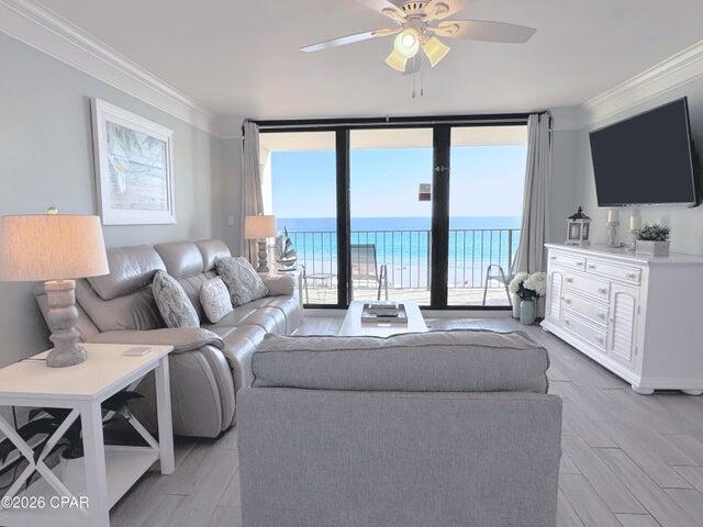 The ultimate coastal luxury retreat or rental investment opportunity! This stunning, newly listed 7th floor condo at Edgewater Beach Resort is in vibrant Panama City Beach, Florida. An immaculate property that was meticulously remodeled from the studs up in 2022, showcasing exquisite upgrades throughout. Step inside to discover premium tile plank flooring, elegant wide trim and crown molding, designer lighting, and smooth ceilings that create an airy, inviting ambience. The show stopping kitchen has been opened and features custom cabinetry, gorgeous quartz countertops, ceiling and lighting upgrade, and stainless appliances. This floor plan highlights a sought-after Gulf-front bedroom with beach views, floor-to-ceiling windows, and a private balcony for savoring sunset skies and the  soothing sound of ocean waves. The spa-inspired owners bathroom boasts a modern tile shower and upscale fixtures. Every detail has been considered for comfort and style, including new doors, contemporary furnishings, a high-efficiency water heater, and AC system. Exclusive access to beaches, pools, hot tubs, restaurant, market, pickleball, tennis, fitness center, golf+pro shop, kids splash pad, game room--all within a gated, beautifully maintained resort. Convenient building-side parking, vehicle charging, and parking for RVs, boats, jet skis, trailers. Pet-friendly for owners, with both the dog beach and park just minutes away. Whether you're searching for a personal family retreat, an active second home, or a high-performing rental property, this exceptional residence delivers the beach lifestyle you've dreamed of.