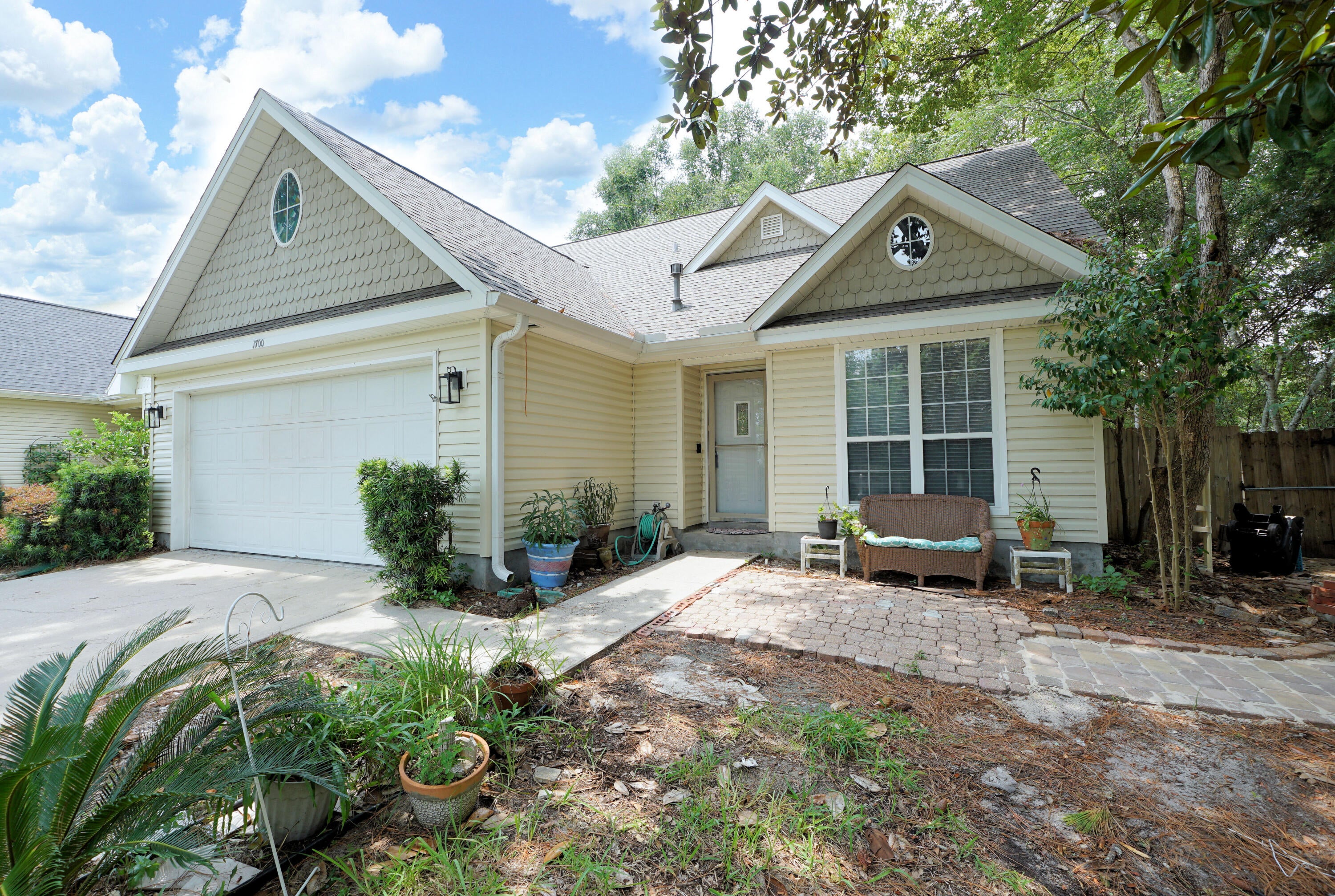This quaint, one owner home is full of charm and welcomes you the moment you step inside. Situated on a desirable corner lot in the heart of Niceville, this property offers a convenient downstairs primary suite featuring a spacious walk-in closet as well as a secondary closet tucked under the stairs. The light, bright ensuite bathroom features a separate soaker tub and shower, along with double vanities. Upstirs you'll find two additional bedrooms and a full bathroom, providing plenty of space for family or guests. The walk-in attic storage area is accessed thru one of the upstairs bedrooms, and ideal for storing all the items you only need on a special occasion! A versatile flex room on the main level is perfect for a home office, playroom or hobby space and leads directly to fenced backyard. The shade covered concrete patio is where you can grill or read a book. The kitchen overlooks the front yard and provides a cute nook for coffee and breakfast! Dining Room can accommodate a table large enough for family gatherings. Living Room has vaulted ceilings and a fabulous fireplace for crisp evening where the family will gather. Make it a priority to see this home today!
Buyer to verify all measurements and pertinent information.
