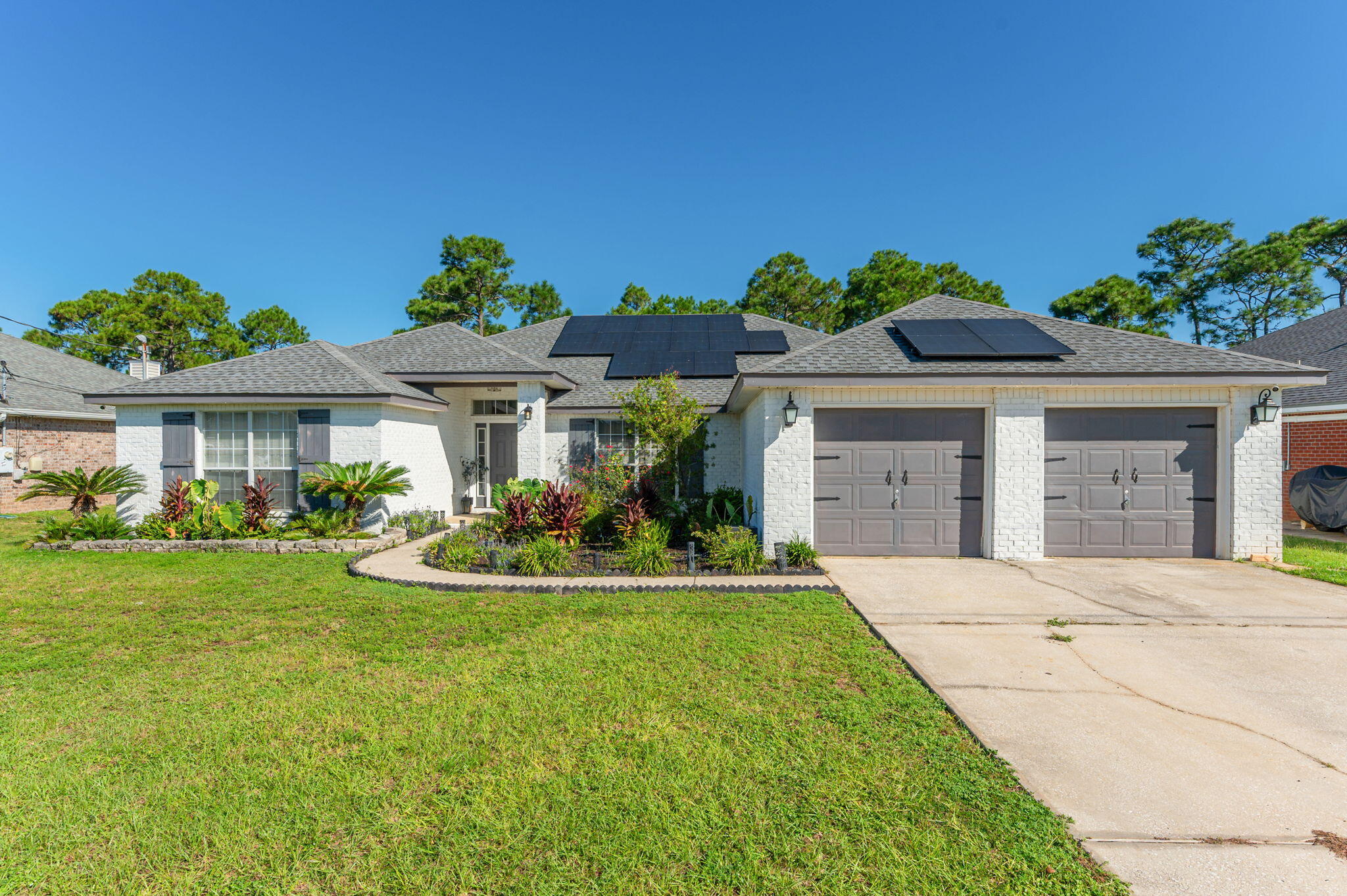 THE UPGRADES? DONE. THE SOLAR? PAID OFF. THE YARD? HUGE. THE HOA? DOESN'T EXIST.

4 BED + DEN/OFFICE | 2 BATH | 2-CAR GARAGE | HUGE FENCED YARD | OVERSIZED DECK THAT LIVES LIKE AN EXTRA ROOM

The split-bedroom layout gives everybody their space without making the house feel disconnected. The primary suite gets its own side with a soaking tub, separate shower + dual vanities, while the guest bedrooms and full bath are comfortably tucked away on the other side.

The family room? Right in the middle of everything. Straight sight lines to the kitchen, upgraded granite counters, Samsung Smart Appliances (2024), and room for game days, dinner nights, homework, friends--or whatever chaos is happening that day.

Then there's the bonus den/office. Work. Game. Create. Hide. Power nap. We don't make the rules.

Outside? THAT'S THE FLEX. A HUGE fenced backyard and an oversized deck that lives like another room of the house--just outside. Set up the outdoor living room, fire up the grill, bring out the game-day crew and let the party spill outside. Dogs running. Kids playing. Friends staying way longer than planned. Plus, the barn-style shed/outbuilding gives all the extra stuff somewhere to go.

And the upgrades? DONE FOR YOU.

ROOF 2021 | WATER HEATER 2026 | SAMSUNG SMART APPLIANCES 2024 | OVERSIZED DECK | PAID-OFF SOLAR

No long someday list waiting for you. Drop your bags. Unpack. Kick up a little dust. This one's ready for real life.