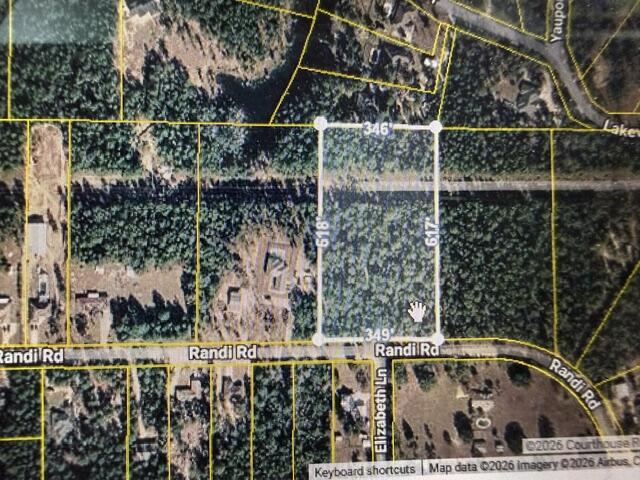 Wooded 5 acres lot waiting for your use/plans. Park on it, Build on it, or divide it into smaller lots. Use all the acreage or subdivide your own parcels for sale. Approx 350 feet of frontage on Randi road you can break the acreage up as the county permits. Electric utility is available at Randi Road. Neighborhood has public water and uses septic tanks. There is an electric power line easement across the back section of the property. Buyer to verify all information deemed important.