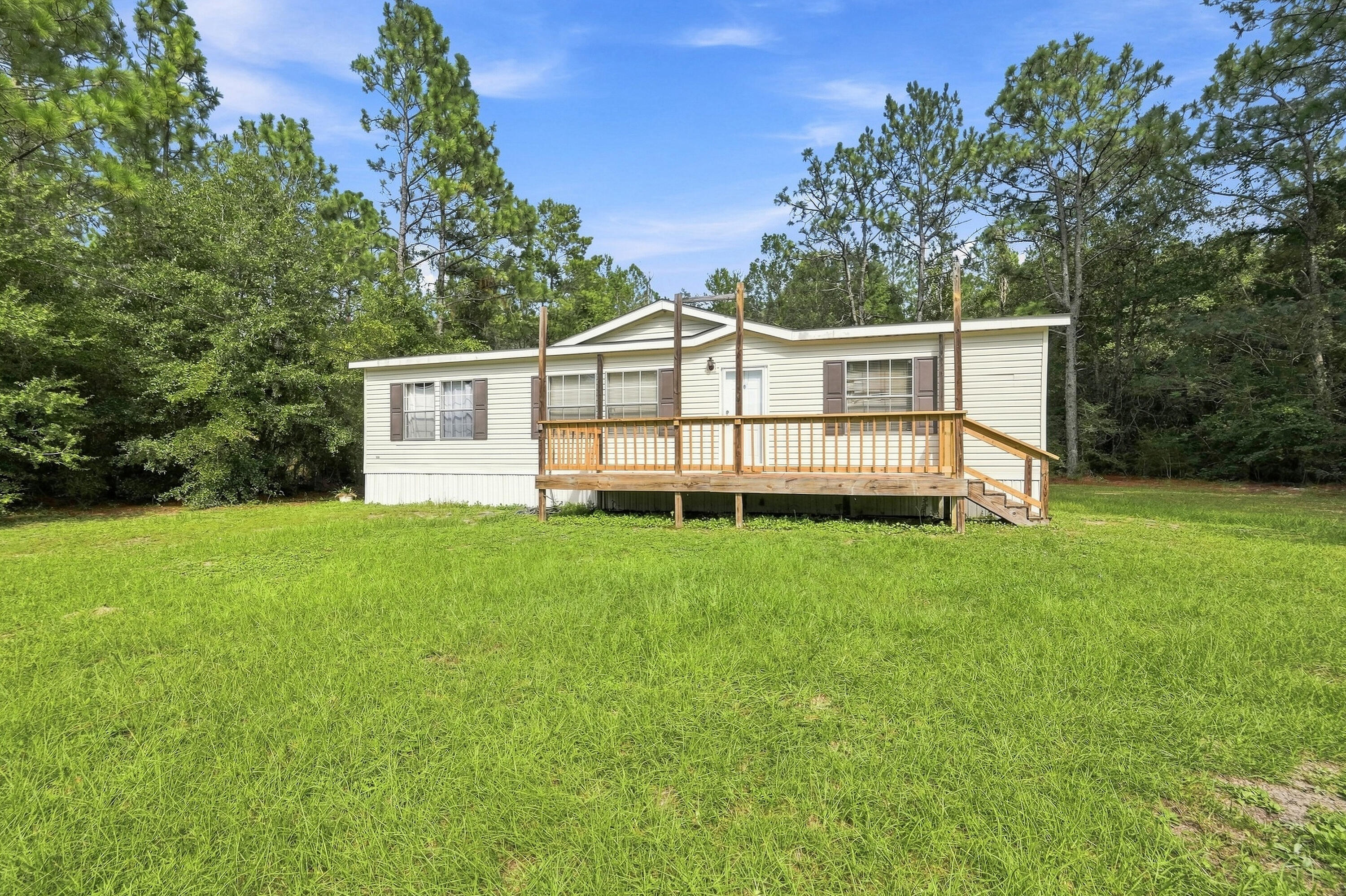 Spacious 3-bedroom, 2-bathroom rental home situated on a generous 1-acre lot. The home features an oversized front porch, perfect for relaxing and enjoying the peaceful surroundings. With plenty of indoor and outdoor space, this property offers privacy and room to enjoy the expansive grounds. A great opportunity for those looking for a comfortable home with a large lot and inviting outdoor living space.