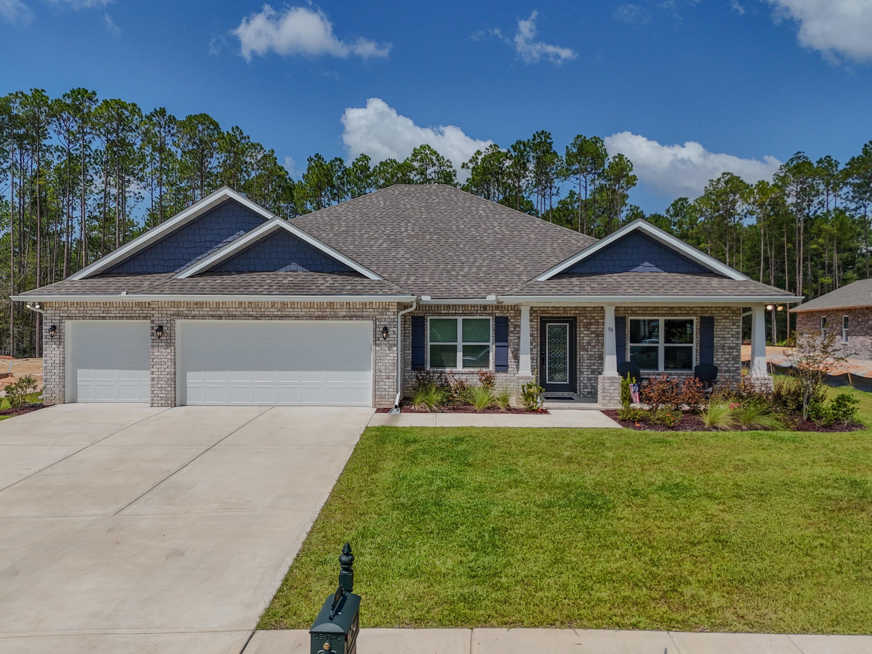 Welcome to 94 S Bentgrass Road, located in the gated community of Windswept Estates! Built in 2025, this nearly new home offers 2,784 square feet of living space and is ready now--no need to wait for new construction. The spacious floor plan features 3 bedrooms, 3 full bathrooms, a private office/den, and a formal dining room. An additional 158 square feet was added to the living room, creating even more space for relaxing and entertaining.

The beautifully designed kitchen offers quartz countertops, abundant cabinetry, and a large walk-in pantry for exceptional storage. The primary suite provides a comfortable retreat with its own sitting room, adding valuable flexibility and living space.

Situated on a generous .6-acre lot, the backyard is a blank canvas with plenty of room to create your ideal outdoor oasis or add a pool. Windswept Estates offers the perfect combination of neighborhood amenities and room to breathe, with low HOA dues and homesites beginning at a minimum of half an acre. Residents enjoy a clubhouse, swimming pool, playground, tennis and pickleball courts, pavilion, food trucks, and holiday gatherings--all surrounded by a beautiful five-star championship golf course.

This home is priced to sell quickly, so don't wait--schedule your private showing today!