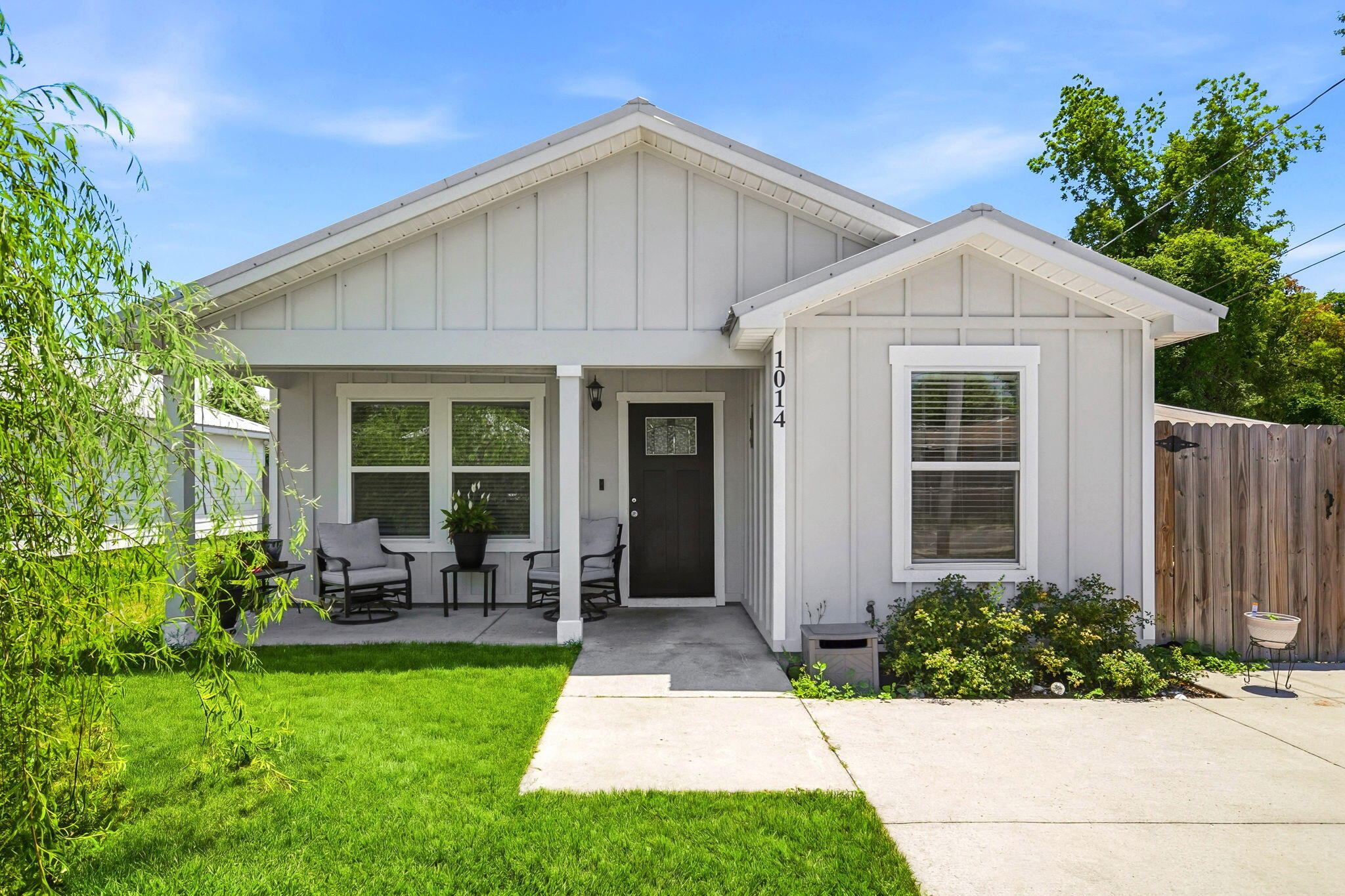 **Welcome Home to 1014 Hamilton Ave, Panama City, FL 32401**

Discover incredible value in this charming 3-bedroom, 2-bathroom home now available in the heart of Panama City! At just 1,056 square feet, this thoughtfully designed residence proves that smart living doesn't have to break the bank. Every dollar stretches further here, making this an exceptional opportunity for first-time buyers, savvy investors, or anyone seeking affordable coastal living.

Step inside and you'll immediately notice the beautiful tile flooring flowing seamlessly throughout the entire home. Vaulted ceilings in the living and dining areas create an airy, open atmosphere that makes the space feel wonderfully expansive. The kitchen is a true standout, featuring gleaming granite countertops and stainless steel Whirlpool appliances that blend modern style with everyday functionality. The spacious master bedroom offers a private en-suite bath, providing your own personal retreat after long days.

Outside, this gem continues to impress. A durable metal roof delivers lasting peace of mind, while lush Bermuda grass in both the front and back yards is maintained effortlessly thanks to a built-in irrigation system. Gather friends and family around the outdoor fire pit on cool Florida evenings, all within the comfort of a privacy-fenced backyard.

The location is equally appealing. Bay High School sits just minutes away, with nearby Whittington Park offering green space for recreation and Target Grocery providing convenient shopping access.

At this price point, opportunities like this don't linger on the market. Schedule your showing today before this one slips away!