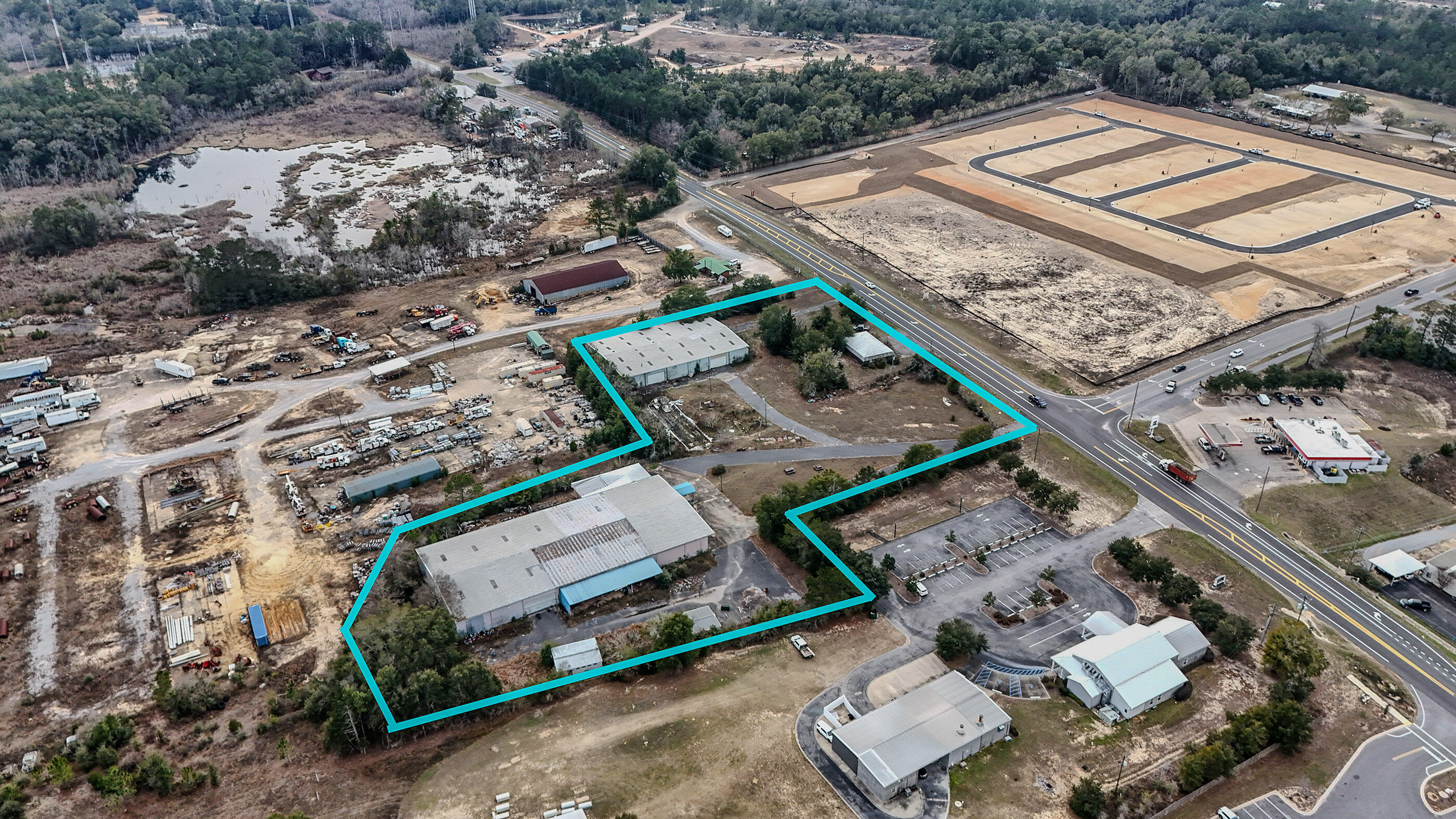 MULTIPLE OFFERS - HIGHEST AND BEST BY NOON ON 05/15/2026.  5.5 acres with 2 warehouses plus small office. Property has a land use of URBAN RESDIDENTIAL but is surrounded by Industrial land use. Largest warehouse is 21,800 heated area, second is 15,400. Small office building is 1,500. All buildings will need some work.  2 older mobile homes are of no value. All are being sold as-is, where-is. Sellers will do no additional clean up on the property.  Property is being shown by Appointment with Listing agent present. DO NOT ENTER PROPERTY. Property for sale only. Any uses willbe approved by Walton County as property is not in the city limits of DeFuniak Springs.