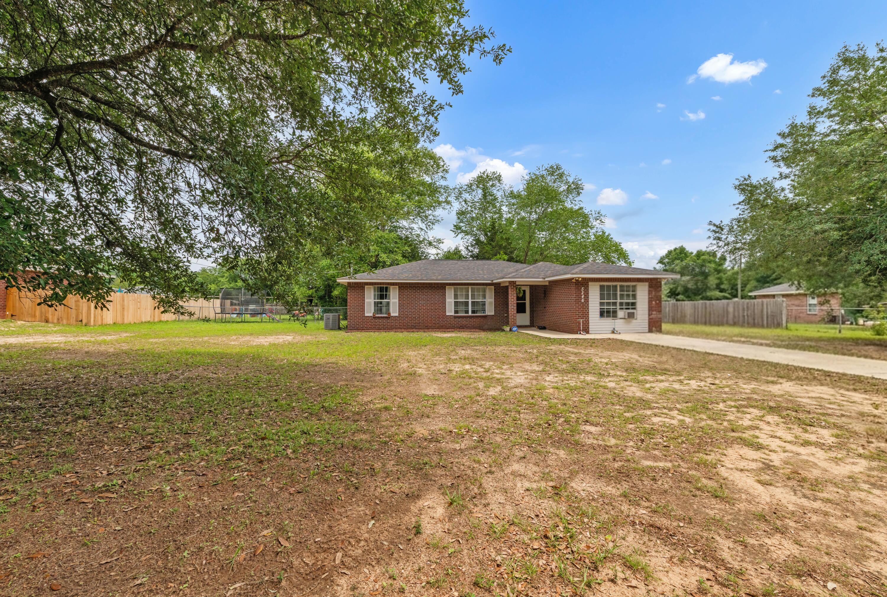 Move-in ready and full of updates, this charming home offers the perfect combination of comfort, convenience, and peaceful living! Ideally located close to shopping, restaurants, and schools, yet tucked away in a quiet setting, this property is ready for its next owner.

Inside, you'll find 3 spacious bedrooms and 2 full bathrooms, along with upgraded flooring and fresh paint throughout. The finished garage provides flexible additional living space and would make a perfect flex room!
Major updates include:

Newer roof (March 2021)
Water heater (2021)
AC system (2026)

Outside, enjoy the fenced backyard, oversized front and side yards, and a fantastic pole barn with attached workshop/storage space -- perfect for parking, hobbies, or extra equipment storage.

Relax and enjoy the peaceful outdoor setting while still being close to everything you need. Don't miss your chance to see this beautiful property before it's gone!