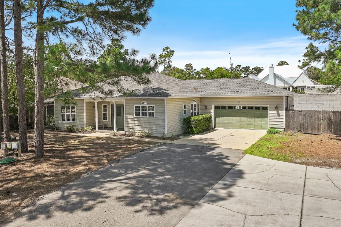 PRICE REDUCED! Classic Ranch in Blue Mt Beach on over 1/2 acre site near County Beach/Access! Conveniently located on low traffic, no through street. Plenty of room for expansion, RV/Boat storage onsite.  Recently refurbished interior 2026 including new HVAC system. New roof 11/2022. Bonus/Flex Room easily utilized as additional, 3rd BR, office, workout space. Seller offering $3,000 allowance for new kitchen appliances. Screened porch/patio. Privacy fenced sizable rear yard great for kids, pets & room for a pool. Pines of Blue Mountain subdivision is buffered on N and E sides by State Forest featuring Nature Trails and is convenient to popular local venues.