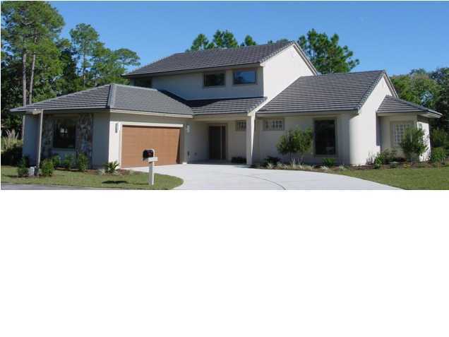 Welcome to this stunning golf course and lakefront home offering an exceptional floor plan, beautiful finishes, and breathtaking views. The attractive stucco exterior, tile roof, and oversized side-entry garage create an impressive first impression.

Inside, the dramatic two-story great room features a built-in media center and gas fireplace, creating a spacious and inviting gathering area. The formal dining room flows into the large kitchen, complete with granite countertops and a breakfast nook overlooking the lake.

The main level features a luxurious primary suite along with an additional bedroom and full bathroom. The primary suite is a true retreat, offering a corner whirlpool tub, separate walk-in shower, dual vanities, beautiful tile work, and a huge walk-in closet. A screened porch provides the perfect spot to relax and enjoy the peaceful golf course and lake views.

Upstairs, you'll find two generously sized bedrooms, a full bathroom with double vanity, and a versatile loft overlooking the great room--perfect for a home office, study area, playroom, or additional living space. With its exceptional location, thoughtful design, and beautiful lake and golf course setting, this home offers a truly special opportunity. Schedule your showing today!