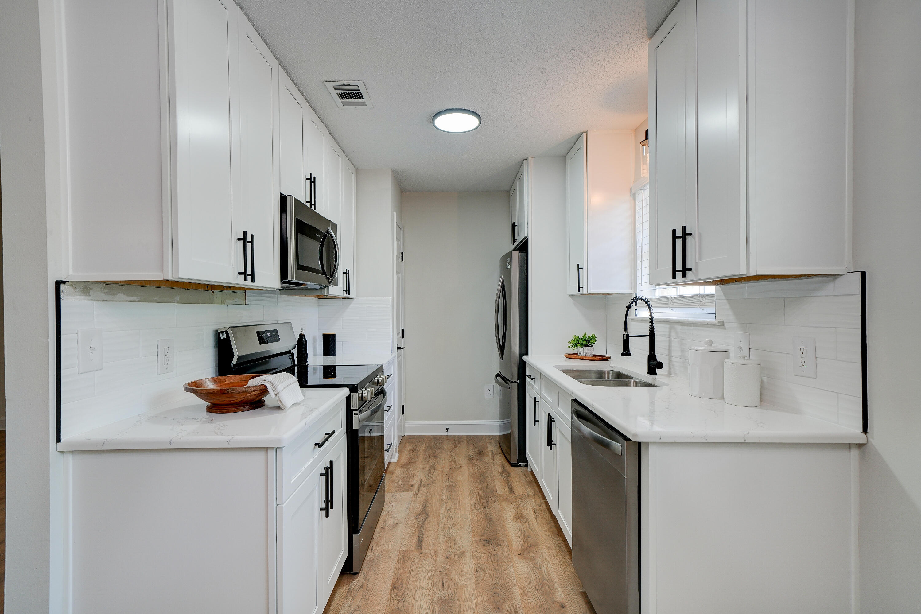 1.02 Acre Updated Brick Home in Freeport for under 340,000. Updated with a 2022 metal roof, 2026 AC, 2026 Kitchen with granite and stainless steel appliances, Laminate flooring floors, and modern finishes. Move-in ready and priced below anything comparable -- this one won't sit long.