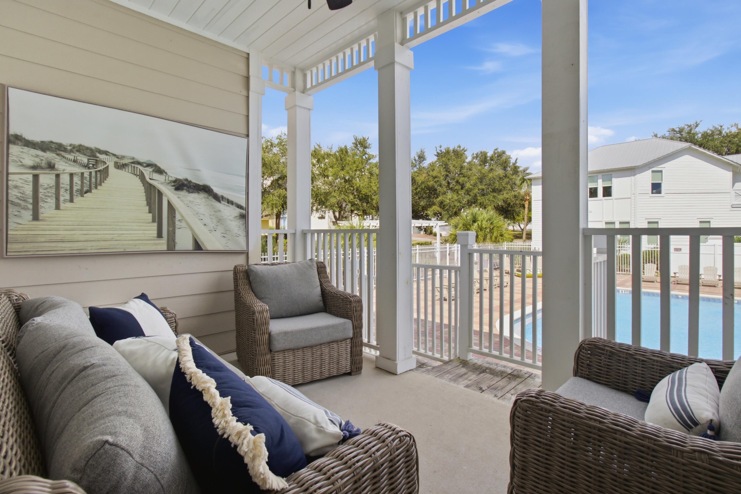 Welcome to Poolside Paradise! This rental machine generated over $69,000 in gross rental income in 2025 and is on track to exceed $67,000 gross in 2026. Rentals currently on the books will convey to the next owner, along with the 6-seater golf cart and bikes. Sold fully furnished and completely turnkey, this beautifully appointed coastal condo is short-term rental ready from day one!

Ideally located in the heart of Blue Mountain Beach, along Scenic Highway 30-A, this coveted ground-level 2-bedroom, 2-bath retreat offers the convenience of easy first-floor living and comfortably sleeps 7. The location is hard to beat, and your private covered porch overlooks the resort-style community pool with direct, easy pool access right from your back door.

Inside, the condo has been thoughtfully updated and beautifully appointed with high-end furnishings and quality finishes throughout. The fully equipped kitchen features granite countertops, a glass cooktop, built-in oven, full-size refrigerator with ice maker, and everything needed for effortless entertaining. Additional conveniences include a washer and dryer, Pack 'n Play, high chair, and beach equipment.

The primary suite features a king bed, walk-in closet, and deluxe walk-in shower. A guest bedroom offers a queen bed, while the third sleeping area includes twin-over-full bunk beds, creating a comfortable setup for families and vacationers. Enjoy resort-style amenities including a large community pool with fountains and a gazebo, outdoor kitchen, putting green, shuffle board and fitness facility. Even better, walk, bike, or take the included 6-seater golf cart to the beach and savor a relaxing day on the beautiful sugar-white sands of the Emerald Coast.

The location truly sets this property apart. Conveniently situated between Grayton Beach and Gulf Place, you'll be within walking distance of local favorites including Mimmo's Italian Restaurant, 30A Thai Cuisine, Real & Raw 30A, coffee, ice cream and so much more. Redfish Lake is also nearby for fishing, paddleboarding, and kayaking.

Whether you're looking for a proven investment property, vacation home, or primary residence, Poolside Paradise offers an exceptional opportunity to enjoy the 30A lifestyle while owning a fully furnished, income-producing property with future rentals already in place. Call to schedule your showing today!