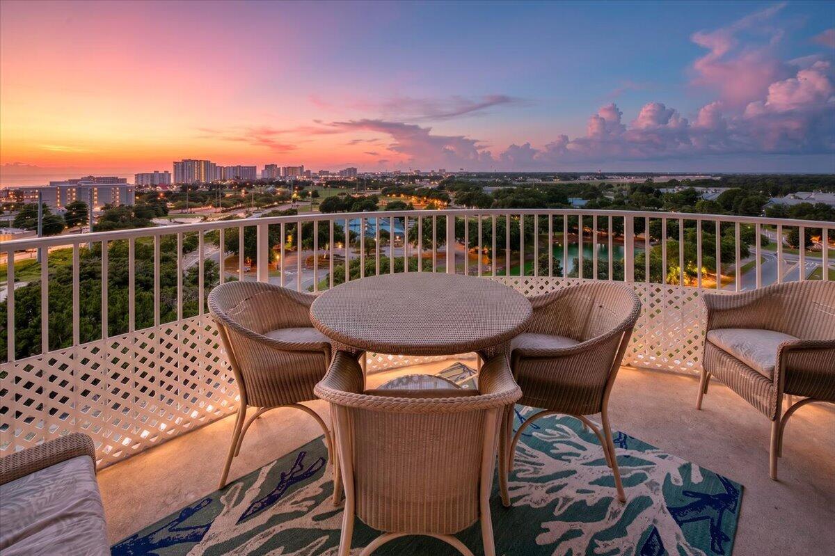 Watch the sun drop into the Gulf of Mexico every evening from your own private balcony. Unit 21014 at The Palms of Destin sits in the coveted west tower, delivering unobstructed Gulf views and legendary Emerald Coast sunsets that never get old. At 970 heated and cooled square feet, this fully furnished two-bedroom, two-bath condo has been completely refreshed -- all new furniture and furnishings throughout, move-in and rent-ready from day one. The Palms is one of the Gulf Coast's most complete resort complexes: a spectacular lagoon-style pool with waterfalls, hot tub, and splash pad; an award-winning onsite restaurant and coffee shop; a 10,000+ sq ft fitness center; pickleball and tennis courts; basketball; poolside tiki bar; and a beach shuttle running mid-March through October. The quarterly HOA covers everything -- electric, water, internet, cable, all building insurance, trash, and full resort amenity access. Bring your personal belongings and your rental calendar. Nothing else required. Comparable well-managed two-bedroom units here generate $45,000-$55,000+ in annual gross rental income. Portfolio financing available -- contact listing agent for current approved lender list. Priced to move. This is the best value in the building for a west-facing Gulf-view unit. See agent remarks for showing instructions. THE UNIT
Unit 21014 occupies a prime position in the west tower of The Palms of Destin Resort & Conference Center -- one of the Emerald Coast's most recognized vacation destinations. The unit has been completely refreshed over the past year: every room features all-new furniture and furnishings, creating a turnkey product that photographs beautifully and is ready to receive guests or welcome a new owner without a dollar of additional investment.
The west tower orientation means this unit captures the two things Destin buyers want most: clear Gulf of Mexico views and those legendary sunset skies -- orange, gold, and pink -- that have made the Emerald Coast famous. This is not a pool-facing unit. It's the quieter, more private perspective. The one you watch the horizon from.
Interior layout features an open-plan living and dining area, a well-equipped kitchen with full appliances, a master suite with walk-in closet, a second bedroom configured with bunk beds for maximum rental occupancy, two full bathrooms, and in-unit laundry. All appliances convey.
THE HOA -- WHAT IT ACTUALLY COVERS:

The quarterly HOA fee covers every operating expense an owner would otherwise carry separately: electricity, water, cable, internet, trash removal, all structural and exterior building insurance, pest control, grounds maintenance, and full access to all resort amenities. There is no separate power bill. No water bill. No insurance premium for the structure.
Owners are responsible only for contents/renter's insurance -- approximately $1,200-$1,300 per year -- and their own personal property taxes. For investment buyers, this is a significant operational advantage: monthly carrying costs outside the mortgage are fixed, predictable, and fully disclosed. No surprise utility bills.
THE RESORT -- AMENITIES IN FULL

The Palms of Destin is not a basic condo complex. The amenity package rivals full-service Gulf Coast resorts: a multi-pool lagoon system with waterfalls, heated pool, children's splash pad, and a hot tub; an onsite restaurant and tiki bar; a dedicated coffee shop; a 10,000+ square foot fitness center; pickleball courts, tennis, basketball, and a grilling area; covered parking; and a complimentary beach shuttle running mid-March through October. For guests, this level of amenity means 5-star reviews, repeat bookings, and premium nightly rates. For owners, demand is driven by the property itself -- not the individual unit.
THE INVESTMENT CASE
West-tower two-bedroom units at The Palms with competent management and optimal pricing have demonstrated $45,000-$55,000 in annual gross rental income. The unit is currently enrolled in a short-term rental program. Buyer may elect to continue with an existing management relationship or establish their own program at closing -- there are no long-term management contracts binding the new owner beyond reservations through early July.
Financing note: conventional Fannie Mae / Freddie Mac financing is not available for The Palms due to the short-term rental concentration in the complex. Portfolio and non-QM lending products are available. Contact listing agent for a current approved lender list.
PRICING CONTEXT

At $315,000, this is the most aggressively priced Gulf-view two-bedroom unit in the complex. The only recent sale of a comparable unit closed at $310,000 in January 2026. This unit is priced near that comp with all-new furnishings and move-in-ready condition that comparable listings cannot claim. For a buyer ready to act, the opportunity cost of waiting is the next available unit at a higher price.