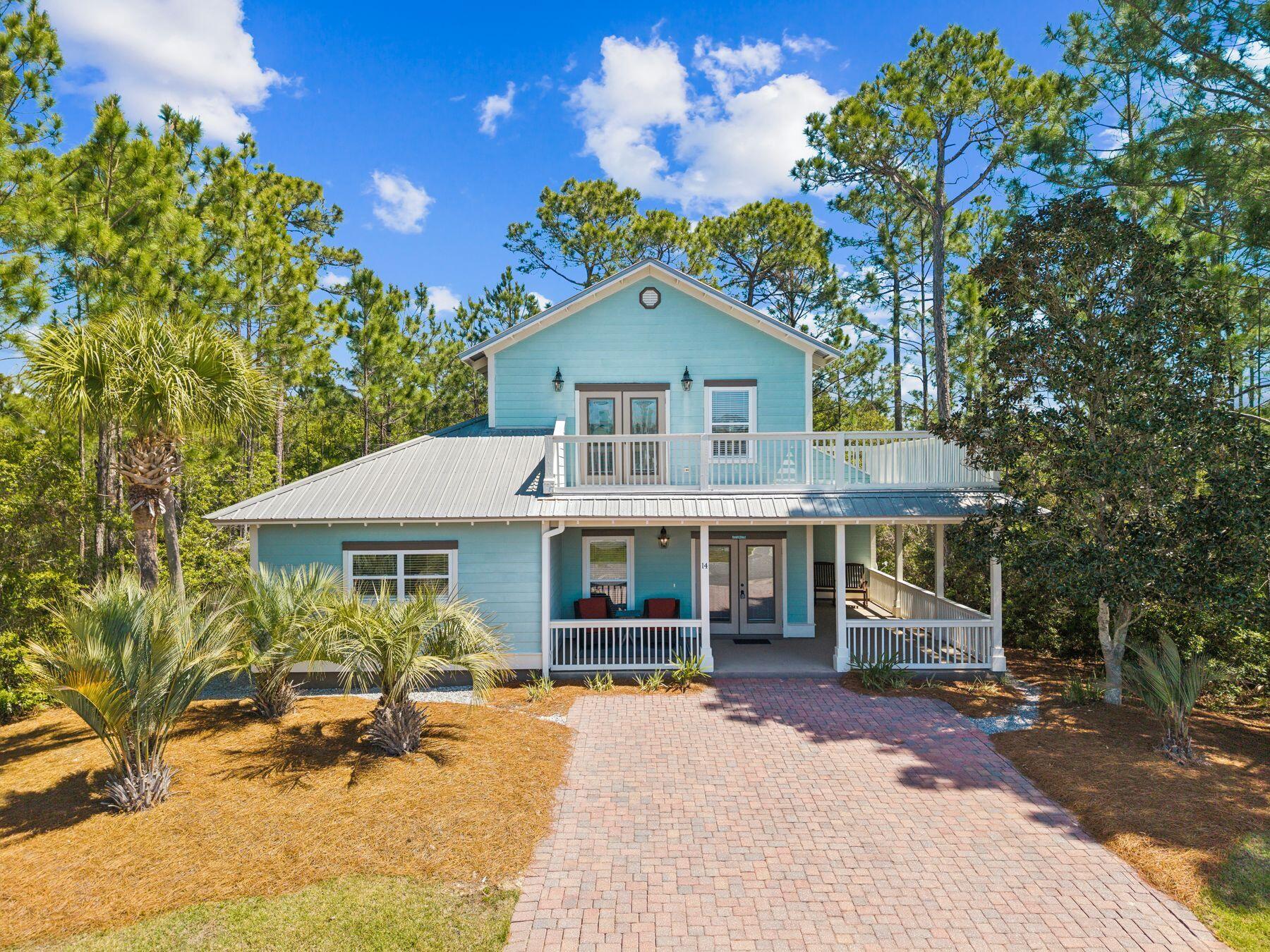 Welcome to 14 Breezeway Boulevard, a beautifully appointed, fully furnished beach house in the gated community of Cypress Breeze Plantation in Santa Rosa Beach along Scenic 30A. Offering 3 bedrooms plus a versatile bonus room that can easily serve as a 4th bedroom, office, or additional living space, this approximately 2,301-square-foot home blends refined coastal style with effortless livability.

Framed by a gracious wraparound porch and set against a private preserve backdrop, the home exudes classic Southern charm. Inside, a thoughtfully designed open floor plan features wood-look tile flooring, crown molding, and an expansive kitchen with quartz countertops, stainless steel appliances, and a generous dining area ideal for gathering and entertaining. Ideally located just moments from Gulf Place, Scenic Highway 30A's white-sand beaches, and close proximity just steps from the community's resort-style pool, residents enjoy both convenience and a relaxed coastal lifestyle. Cypress Breeze offers low HOA dues, a vibrant neighborhood atmosphere, and allows both short- and long-term rentals, making this an exceptional opportunity as a primary residence, second home, or investment property. Recent upgrades include two new Trane HVAC systems (2025) and a water heater (2021).