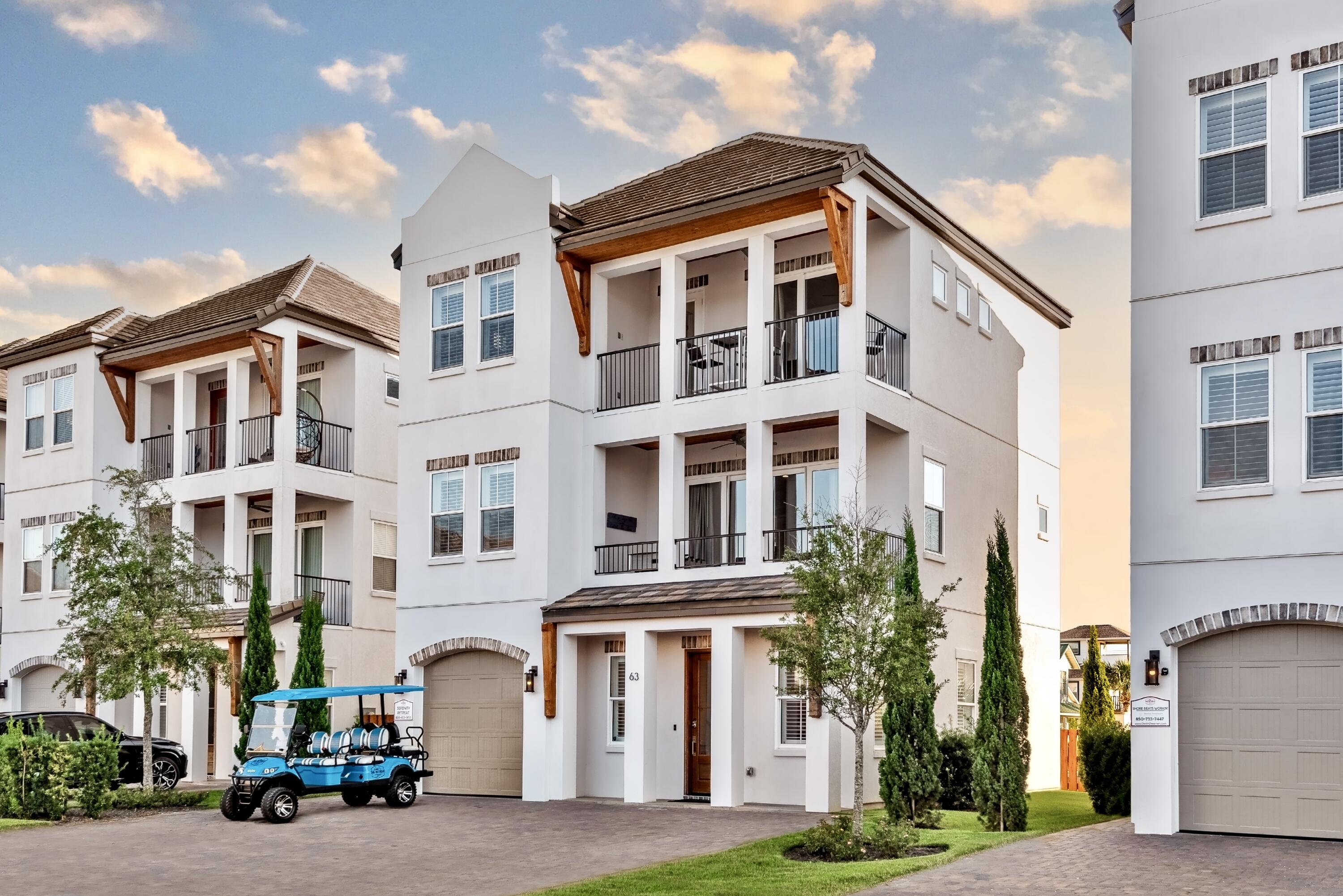 The current property management company, who has successfully managed the home since 2021, is offering a $155k rental income guarantee for 2026 AND 2027, providing a strong foundation for both immediate cash flow and long-term investment stability. Welcome to 63 Wadleigh Way, also known as 'Serenity,' a fully furnished and turnkey luxury vacation rental located in the highly sought-after Retreat at Miramar community. This 6-bedroom, 5.5-bath coastal home comfortably sleeps up to 15 guests and is being sold completely rental-ready, including a brand-new 6-seat street-legal golf cart, allowing for a seamless transition for any investor.

This property offers a proven and consistent rental history, generating approximately $170k in 2023, $147k in 2024, and $153k in 2025, and is currently on pace to reach approximately $160,000 in 2026. With established performance, professional management already in place, and a rental guarantee for 2027, this is a rare opportunity to acquire a stabilized, income-producing asset in one of the Emerald Coast's most desirable short-term rental markets. Additionally, the home carries a 4.98-star average rating across Airbnb and VRBO with 144 reviews, further driving top-of-market performance, increased booking conversion, and strong search ranking across both platforms which transfers with the sale.

Designed with both guest experience and revenue optimization in mind, the home features four king suites with private bathrooms and two bunk rooms, creating an ideal layout for large families and group bookings. The open-concept main living area includes a spacious living room, a fully equipped chef's kitchen, and generous dining space, while additional living areas and a dedicated game room provide multiple entertainment zones that enhance guest satisfaction and repeat bookings. Every bedroom is equipped with a 4K Smart TV, and thoughtful design elements throughout the home create a balance of comfort, privacy, and functionality.

Located directly across the street from the community's 90-foot heated resort-style pool and clubhouse, guests enjoy access to one of the area's most attractive shared amenity packages, including lounge areas, grilling stations, covered seating, and a scenic pond with walking paths. The home is also just a short 2-minute golf cart ride or quick walk to Miramar Beach's largest public beach access at Pompano Joe's, offering convenient access to the Gulf along with nearby dining, shopping, and entertainment. Its central location near Destin, Sandestin Resort, Santa Rosa Beach, and Scenic Highway 30A further supports strong year-round rental demand.

With a strong track record of performance, future income protection through a rental guarantee, and all furnishings and amenities included, 63 Wadleigh Way presents a true turnkey investment opportunity with immediate revenue and continued upside in a high-demand coastal market.