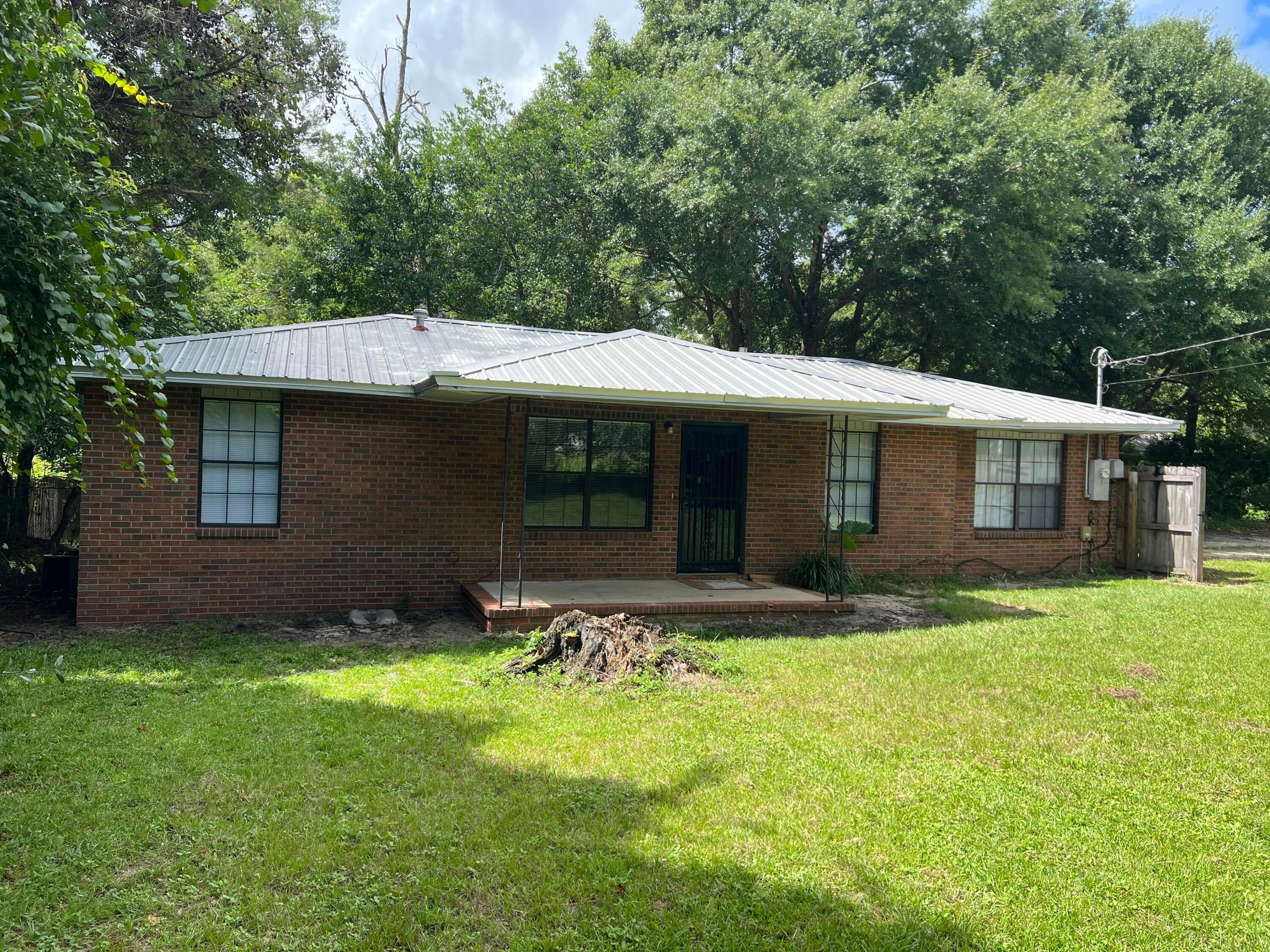 You're going to love this adorable 3 bedroom, 2 bath home in beautiful Defuniak Springs! This recently renovated gem features a cozy front porch that's just perfect for your morning coffee, and an enclosed side patio that can serve as a great storage space or your own hobby corner. With newer vinyl flooring and tile throughout, you won't have to worry about carpets! Plus, enjoy cooking with new stainless steel appliances, a microwave, and a gas stove!


But wait, there's even more! Picture living just a short stroll away - less than a mile or a quick 3-minute drive to the lovely Lake DeFuniak and the charming shops and eateries at Baldwin Ave in historic downtown DeFuniak Springs! As a bonus, Walton County Middle School is only 1/2 mile away. You can also hop over to Walmart, the I-10 interstate, and all the fantastic shopping and dining options in DeFuniak, all within a breezy 5-minute drive! 

Don't wait! Call Newcastle Property Management today to schedule your tour. This cutie won't last long! Reach out to Micah Allison at 850-424-7430 ext 2.