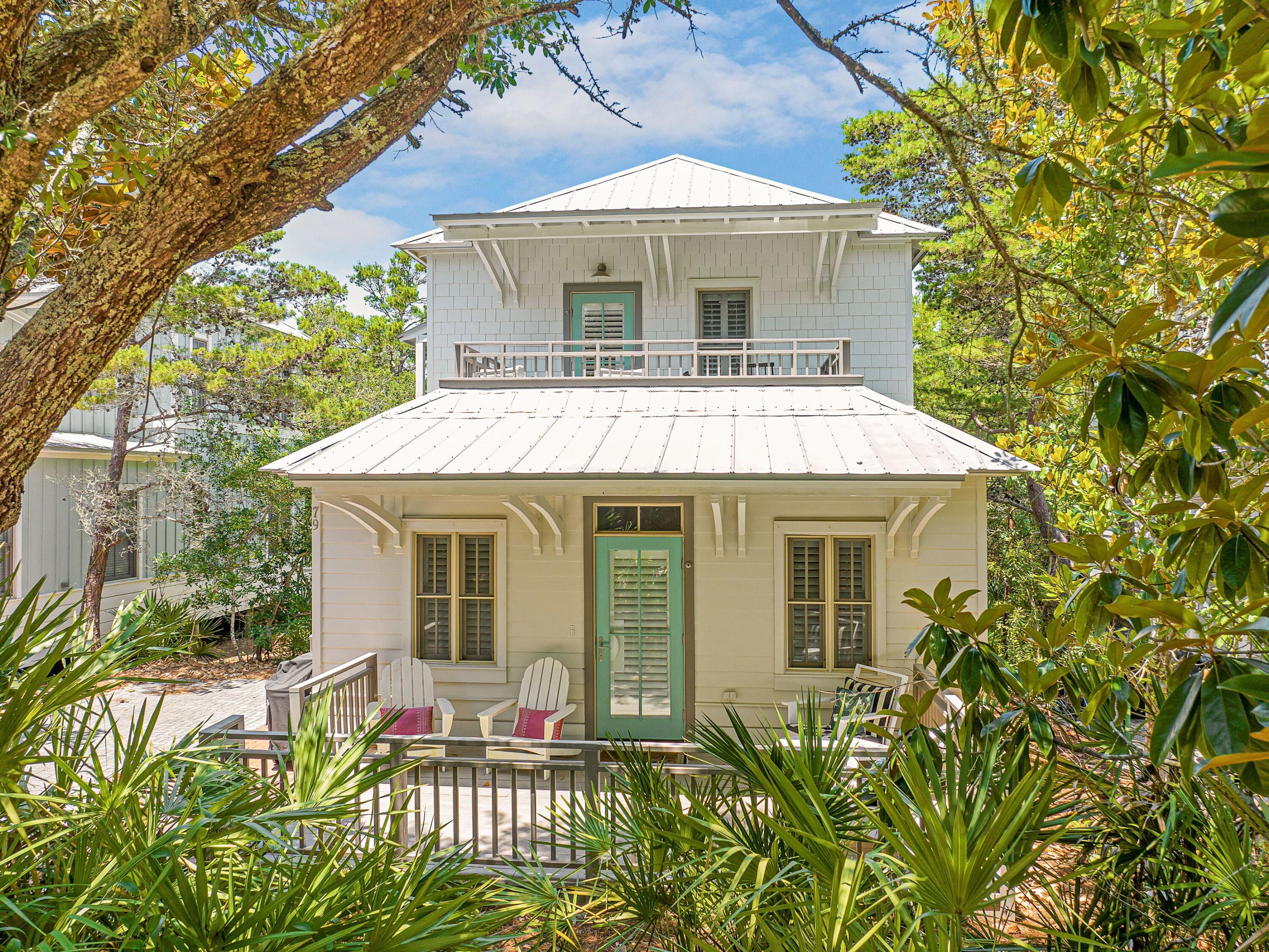 Inspired by the vibrant architecture of New Orleans' French Quarter and the iconic cabanas of Palm Beach, House of Palms offers a fresh, playful take on coastal living along 30A. Beautifully renovated and professionally furnished, this turnkey retreat is located less than 800 feet from the deeded beach access and less than two miles from Rosemary Beach and several of the area's beloved town centers, placing dining, shopping and entertainment just moments away.

Designed to accommodate both everyday living and memorable vacations, the home has been thoughtfully updated with shiplap throughout, all-new bathrooms, stylish furnishings and an enhanced front porch that sets the tone for the experience within. Already established on a successful rental program, the property has been carefully appointed to meet the expectations of today's vacation guests while maintaining the comfort and character owners appreciate.

The first floor features three spacious bedroom suites, each with its own private bath. Two king suites provide comfortable accommodations for adults, while a custom-built queen-over-queen bunk room creates an ideal gathering space for younger guests. An additional bunk nook provides additional sleeping capacity, allowing the home to comfortably host up to 10 guests.

On the second floor, vaulted ceilings and abundant natural light highlight the open-concept living, dining and kitchen areas. The well-appointed kitchen features KitchenAid stainless steel appliances and ample seating, while the adjoining living spaces create a natural setting for entertaining, relaxing and reconnecting after a day at the beach. Three generous porches expand the home's living space outdoors, offering inviting spots for morning coffee, alfresco dining and evening conversations in the coastal air.

Owners and guests enjoy access to deeded beach access and a community pool, making it easy to spend the day on the sugar-white sand or cool off close to home. A neighborhood provisions shop adds convenience for everything from beach essentials to a bottle of wine for sunset gatherings. Situated in the charming 30A town of Seacrest, between Watersound and Alys Beach, it's best known for its beautiful beaches, terrific restaurants, farmers markets, and more for the quintessential coastal experience.

Combining distinctive design, proven rental performance and an exceptional location along Scenic Highway 30A, House of Palms presents an outstanding opportunity to enjoy the best of Emerald Coast living.