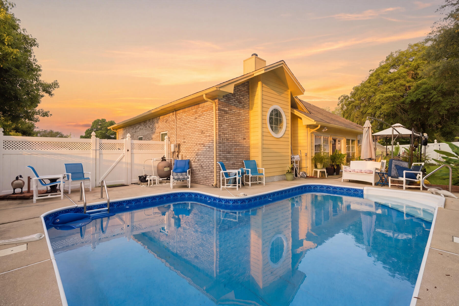 This POOL home with water views from the front lawn is situated on a beautiful lot with a lush lawn in a highly desirable neighborhood of Shalimar. Kitchen showcases white cabinets and quartz countertops with a large window in the breakfast nook. A desirable split floor plan PLUS a bonus room makes this home inviting. Master bedroom boasts a spacious double vanity, shower and soaker tub. Don't miss out on the opportunity to live in Lake Lorraine Estates where golf and tennis meets bay views with no HOA.