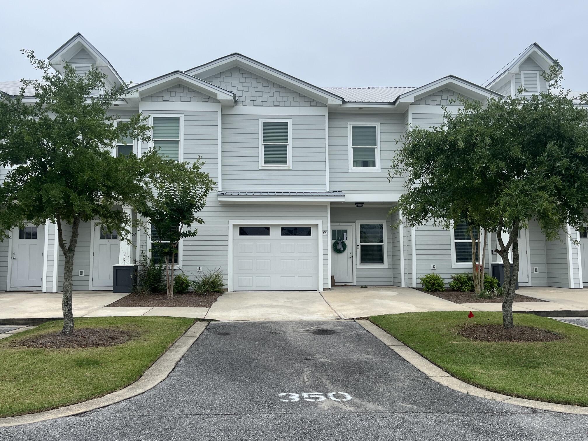 Best value for a garage unit in the community. This Savannah floor plan features 3 bedrooms, 2.5 baths, and a rare 1-car garage along with a spacious primary suite with a large walk-in closet. --- a highly sought-after feature that adds convenience, storage, and long-term value. This townhome offers both value and location. Ideally located just 25 minutes from the beautiful beaches of 30A and near convenient access to fishing at the 331 Bridge.Interior photos are stock images but are similar to the actual finishes. The home offers LVP flooring throughout the main level with carpet upstairs. Community amenities include a pool, pickleball courts, basketball courts, and a playground -- making this an excellent option for primary residents, second-home buyers, or investors alike. The property is currently income-producing with a tenant in place through September 30, 2026.