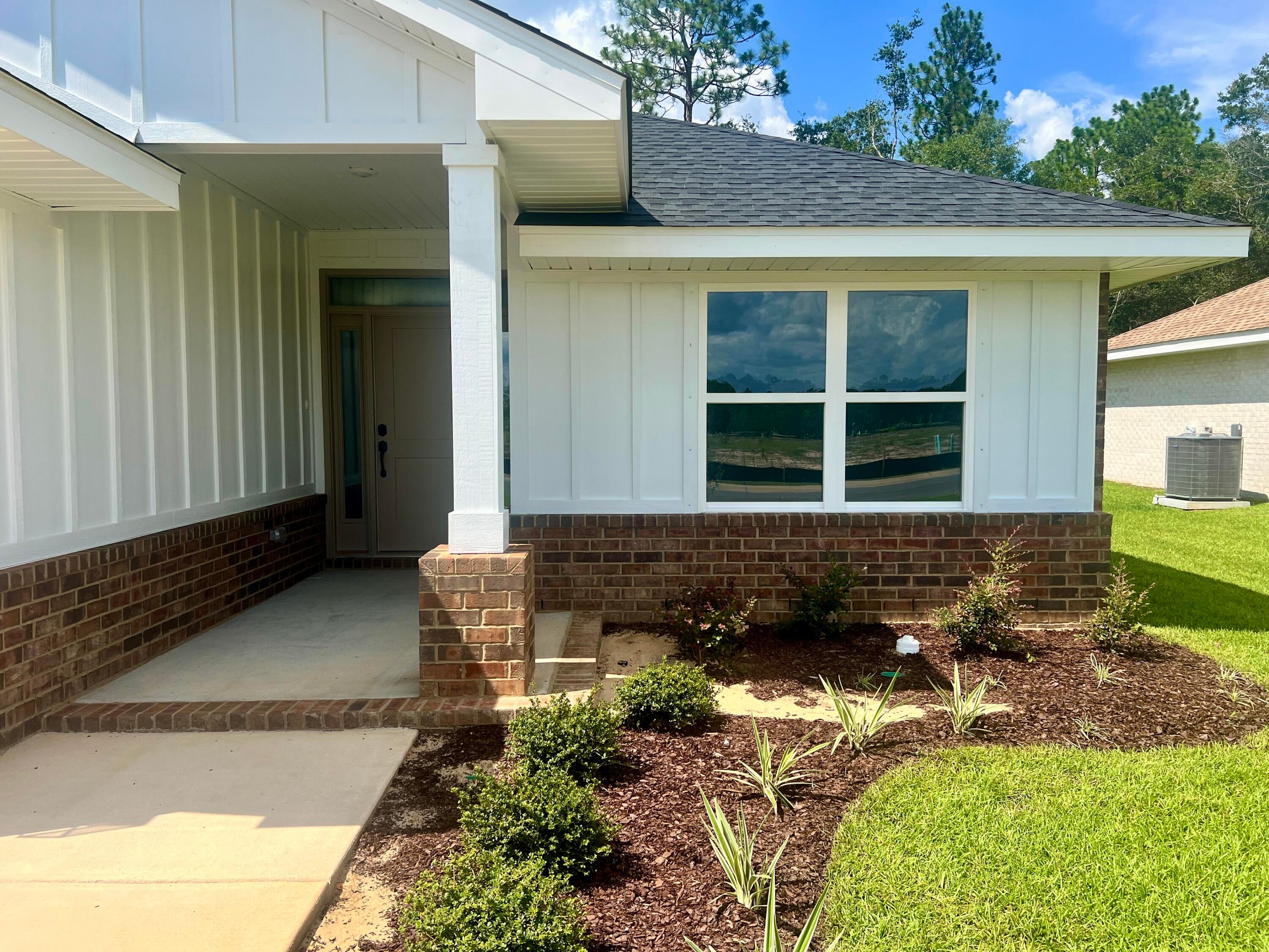 Welcome to HIDDEN PINES by Adams Homes. Located just 30 minutes to Navarre Beach, with close proximity to schools, shopping and much more. This home is 3-sided brick with Hardi design front, 2 car automatic garage, sprinklers with timer, and a sodded yard with a landscaping package. Some upgrades that are being added to this home include granite/quartz countertops in kitchen and bathrooms, Puretec LVP flooring everywhere with carpet only in bedrooms, craftsman style elevation, and a tile shower in the master bathroom.