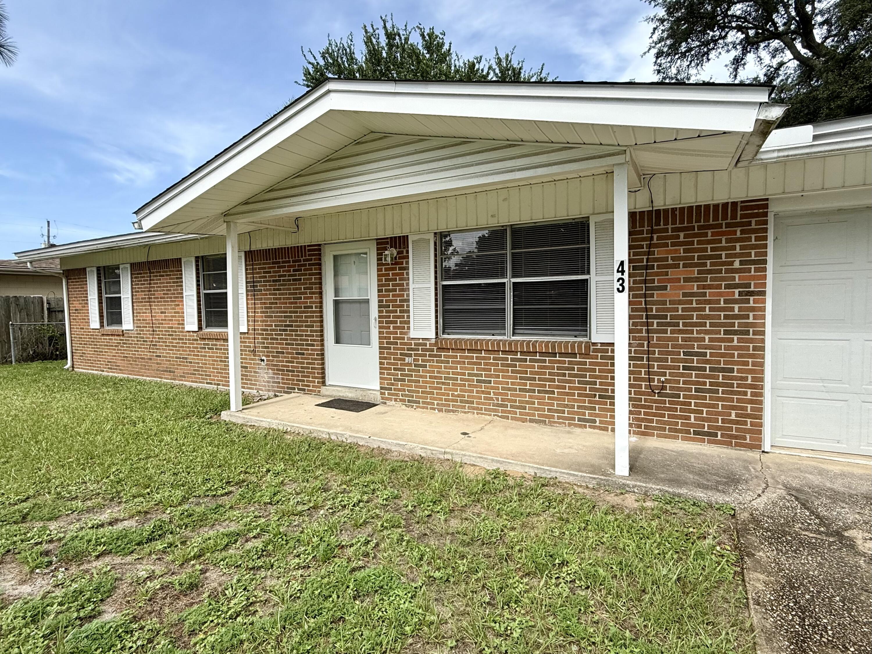 Very Nice home in Shalimar.  This 3-bedroom 2 bath home has a garage and large backyard / a covered patio and storage shed.  The living room/dining room area allows an open concept style living.