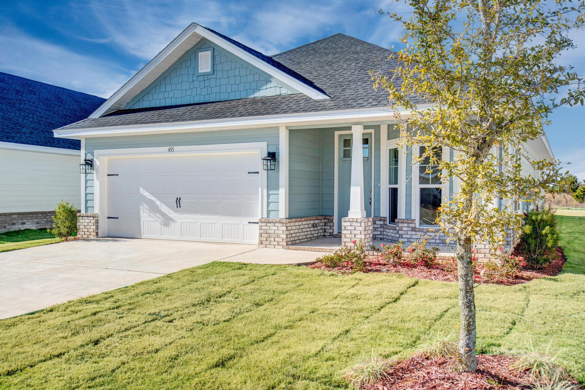 This popular Craftsman-style 3BR/2BA home (currently under construction: (Est. Aug/Sept completion) is ideally located in the back of the Community backed up to the woods. Designed with both comfort and style in mind, the home features HardieBoard® siding with a brick skirt, vaulted ceilings,  and CoreTec Pro Plus luxury vinyl plank flooring throughout--no carpet. The spacious primary suite boasts elegant tray ceilings, a generous walk-in closet, and a spa-inspired bath. Quartz countertops in the kitchen and baths, soft-close cabinetry, spacious covered patio complete this inviting home, perfect for relaxed everyday living and entertaining. Riverwalk residents enjoy a community pool, clubhouse, fitness center, scenic nature trail, and neighbor hood dock, offering plenty of opportunities to get outside and enjoy the Florida life style.  Adams Homes is offering move in ready package that includes blinds, refrigerator, and washer and dry! Pics are of a similar home.*