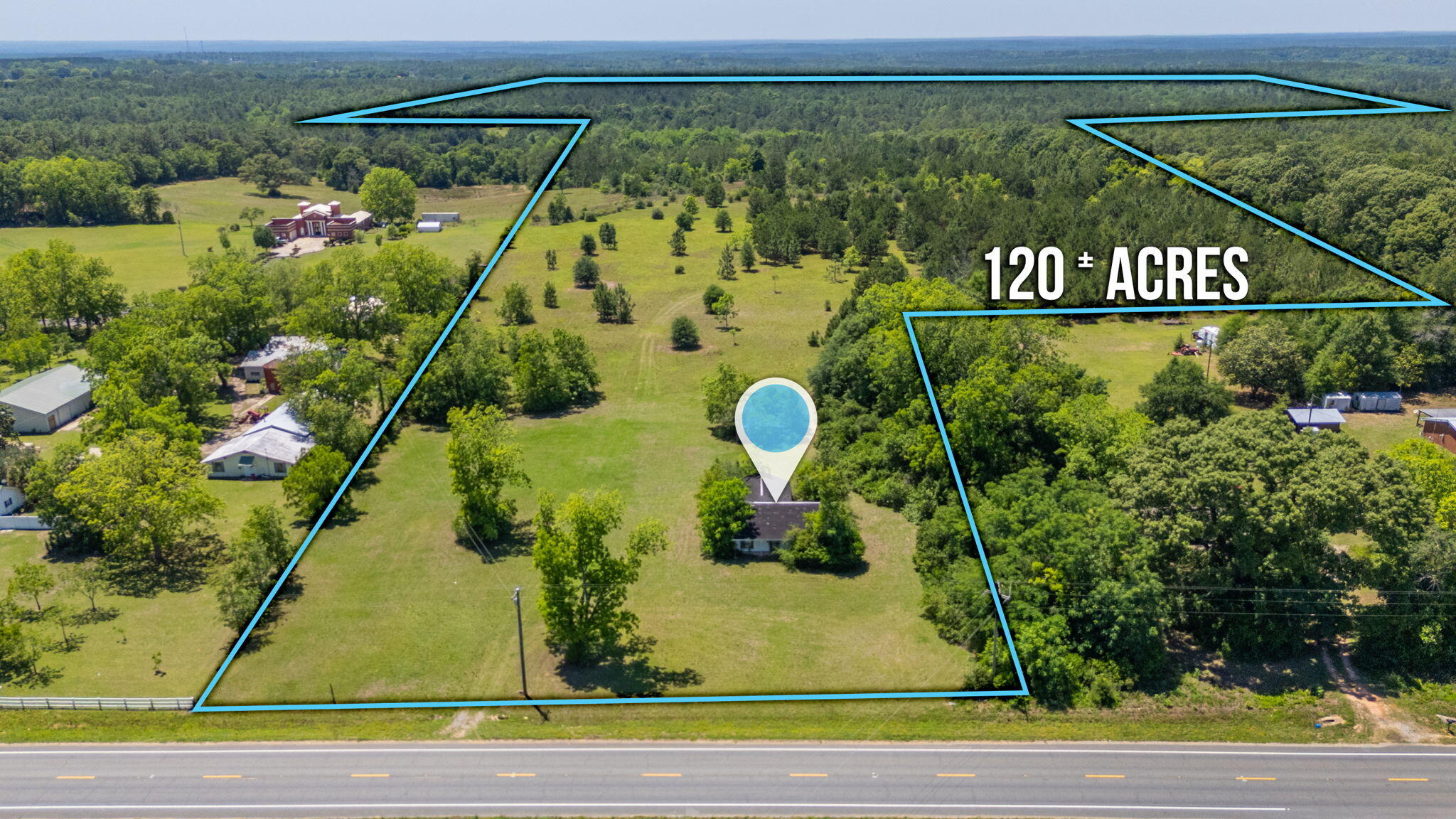 120± Acres | Development & Investment Opportunity | 5 Parcels Together | Hwy 85 Frontage

Rare opportunity to acquire approximately 120± acres comprised of five parcels with approximately 275 ft. of frontage along Highway 85 in growing North Okaloosa County. This unique property offers a combination of open land, mature timber, a creek corridor, & a small lake/pond feature located on the corner of the land.

The residential structure is 1911 sq. ft.  constructed in 1997; featuring 2 bedrooms, 2 bathrooms, garage, and a porch. The home is currently unoccupied and its condition is unknown. 

The property's expansive acreage, unique layout, natural features, and direct Highway 85 access offer exceptional versatility and potential for a variety of future uses. Whether envisioned as a residential development, private estate lots, family compound, farm, long-term land investment, or recreational hunting retreat, there are many possibilities to suit your vision.

Currently zoned RR with water available through Auburn Water System and electric on SR 85. Land and improvements are being sold AS-IS. Buyers are encouraged to conduct all inspections and due diligence to verify condition, zoning, land use, development feasibility, utilities, access, & intended use.

Conveniently located near Crestview, Duke Field Military base & the rapidly expanding Northwest Florida growth corridor, this property offers the perfect balance of accessibility, privacy, & rural charm