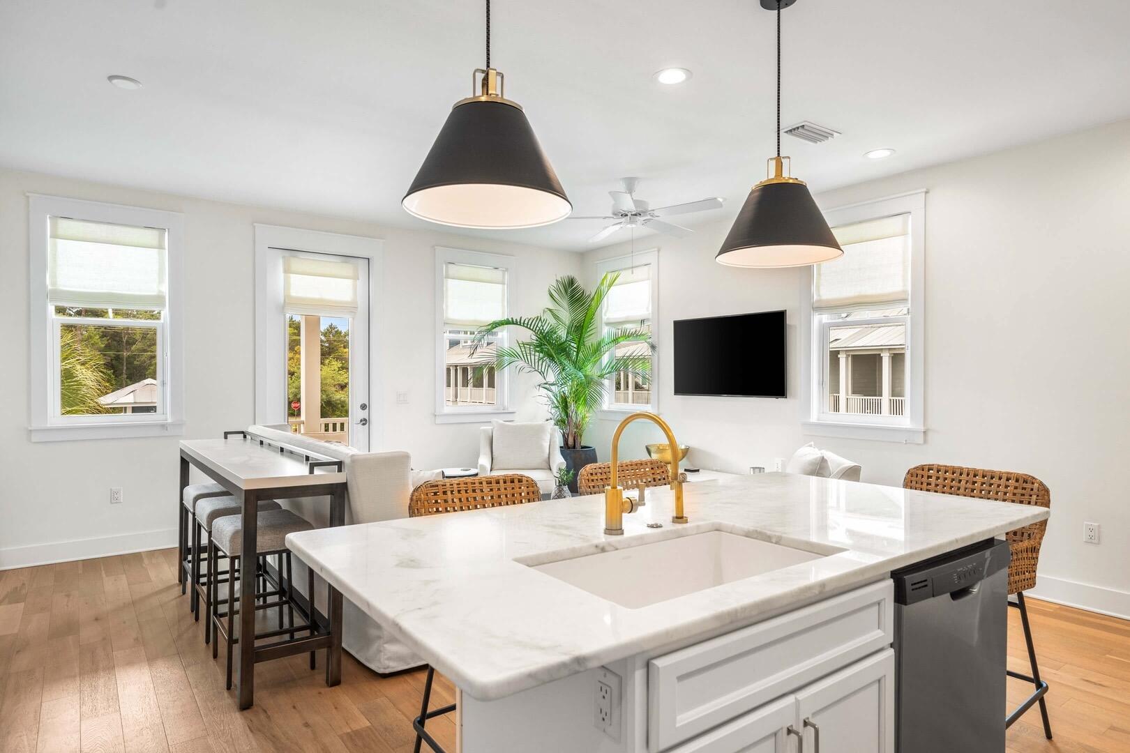 Discover coastal living and turnkey rental potential at The Retreat at Blakeside, a beautifully appointed end-unit townhome in the heart of Seagrove Beach along Scenic Highway 30A. Located in the desirable 30A Townhomes community, this spacious 3-bedroom, 2.5-bath residence with built-in bunks offers an exceptional combination of location, thoughtful upgrades, and established short-term rental use.

Situated just steps from the community pool, the property is less than half a mile from multiple public beach access points and conveniently located near Eastern Lake, Point Washington State Forest trails, Greenway Station shopping and dining, and many of the restaurants and attractions found throughout the 30A corridor.

Inside, the home features hardwood flooring, marble kitchen countertops, subway tile backsplash, upgraded fixtures and furnishings, and coastal-inspired décor throughout. The open-concept second-floor living area offers comfortable gathering space, a Smart TV, and a custom built-in wet bar with cabinetry, shelving, and beverage refrigerator.

The kitchen is equipped with stainless steel appliances, generous prep space, and breakfast bar seating for six. The living area opens to a covered balcony overlooking the community pool with additional outdoor seating and dining space. The thoughtfully designed floor plan provides flexible accommodations for owners and vacation rental guests. The second-floor primary suite features a king bed and private ensuite bathroom with walk-in shower. The first floor includes a second king bedroom with private patio access, an additional bedroom furnished with a queen and XL twin bed, and a built-in twin-over-twin bunk nook with a barn door for privacy. A full guest bathroom, laundry area, and covered first-floor patio complete the layout.

The property is offered fully furnished with the exception of select owner closet items, providing an opportunity for a buyer seeking a furnished second home, primary residence, or established vacation rental. An attached one-car garage and driveway provide additional parking and storage.

The property is currently operated as a short-term rental and has completed applicable STR inspections. The fire sprinkler system has been serviced and the property has passed its required short-term rental inspections. Documentation is available for verification.

After approximately three months under its current property management program, the property has approximately $50,000 in gross rental bookings for the current year as of the listing date. Rental history and current reservation information are available upon request. Existing and future reservations, revenue, occupancy, and rental performance are subject to change and are not guaranteed.

With its Seagrove Beach location, end-unit positioning, community pool, proximity to multiple beach accesses, upgraded interiors, furnishings, established rental history, and completed STR inspections, The Retreat at Blakeside offers a compelling opportunity to own a turnkey property along 30A.