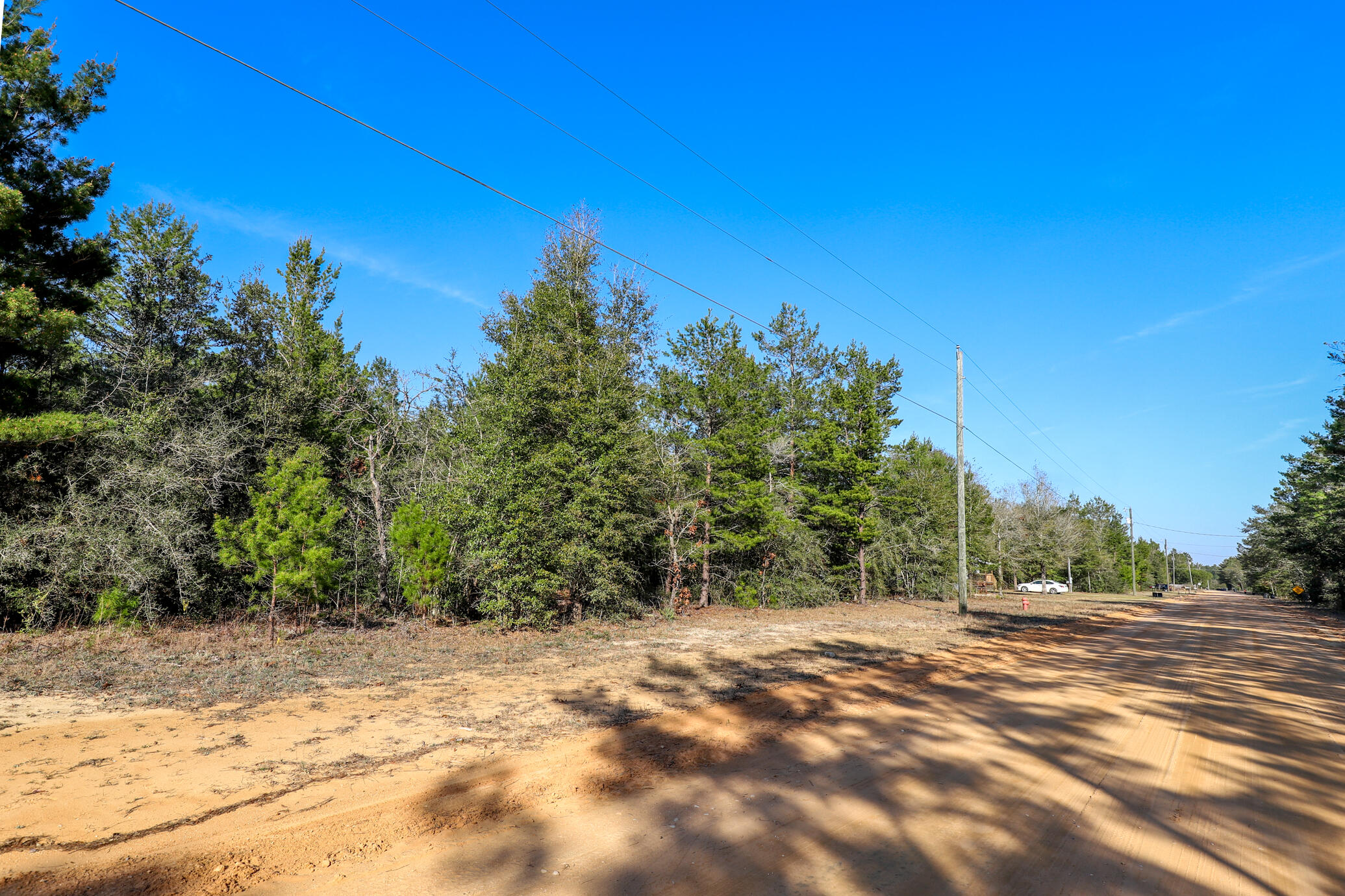 Build your getaway home or place a mobile home with no HOA fees! 

Vacant wooded lot 0.22 of an acre in size with convenient access to main highways. (HWY 90, I-10, 285, and 331). It is less than ½ mile from HWY 90 and less than 1 (one) mile from a public park with a lake (Beaver Lake). 

This property is near many great outdoor activities like fishing, golfing, national parks, and the beautiful beaches of the Emerald Coast! (Close by popular cities: Niceville, Crestview, Fort Walton Beach, Destin Florida, 30A / Seaside, and Panama City Beach) 

While no utilities are currently in place on the lot, power and public water are available in the area, and a septic system would need to be installed for sewer service.

Gps location:
https://maps.app.goo.gl/ECLieuun95dgUUQAA