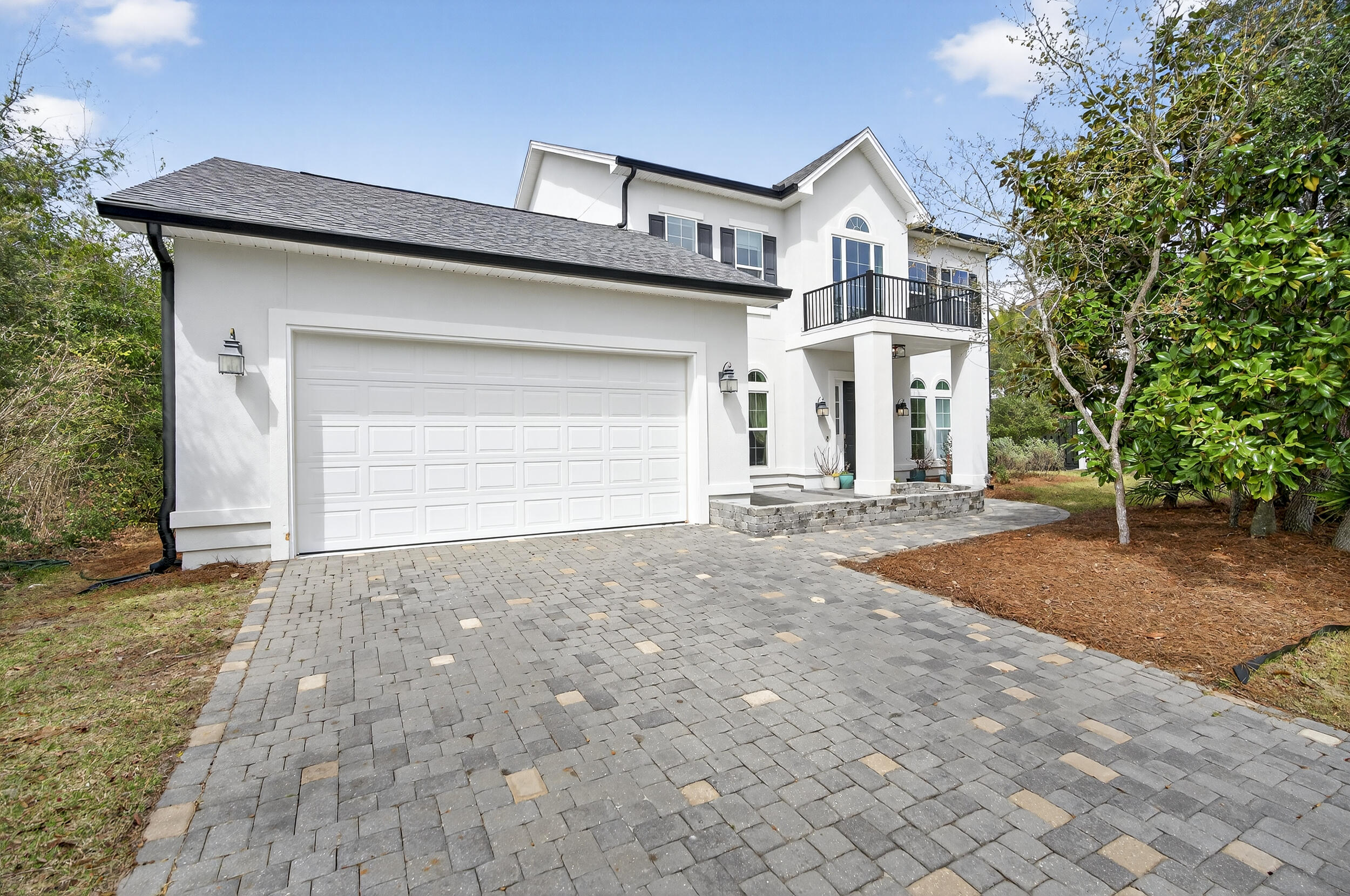 3202 Blue Heron Boulevard is a beautiful, spacious home in the private, gated community of The Preserve on the Bay!  It's location in East Panama City Beach provides access to the amazing emerald waters and white sugar sand beaches of the Gulf along with St. Andrews State Park, marinas, access to the Bay, and great restaurants and entertainment options!
Built in 2019, this home boasts 4 bedrooms and 4 full bathrooms, with an additional half bath on the first floor. The large primary suite is conveniently located on the first floor.  The home spans 3,420 square feet of spacious, luxury living on a .26 acre lot. There is an addition living area on the second floor that can also serve as a library, theater, game room, office space or bonus room!  Upgrades in this spacious home include;  a paver patio with a half wall in the front of the house, all closets have built in shelving, built in shelves and seating in the Library/upstairs living area,  banquette seating in the kitchen, 2 triple bunk beds in one of the bedrooms to accommodate a large family or guests. This home also has rain gutters on the front and back of the home, a new Bosch dishwasher, double oven with air fryer feature new in 2023, a gas stove and a tankless water heater.  The oversized 2 car garage has room for storage or space for a golf cart.  The spacious back yard would also accommodate a swimming pool!