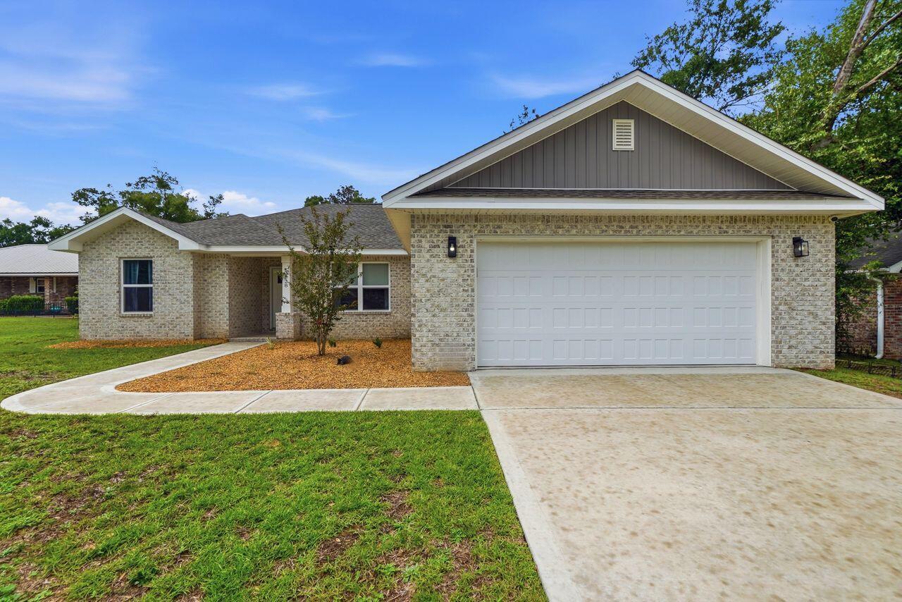 Great level lot with privacy fenced backyard and NO HOA. The yard extends several feet beyond the fence. This 2024 home built by a local builder offers a spacious open concept living room and eat in kitchen,  4 bedrooms and 2 bathrooms. Beautiful quartz countertops in kitchen and baths, white shaker cabinets throughout, luxury vinyl flooring throughout (NO carpet), bedrooms have ceiling fans and the washer and dryer convey.  ADT System will be paid in full so new owners will only have a monthly service fee if they choose to use the system.  Don't miss out on this nearly new home but with bonus perks of a privacy fence, security system, and washer and dryer!