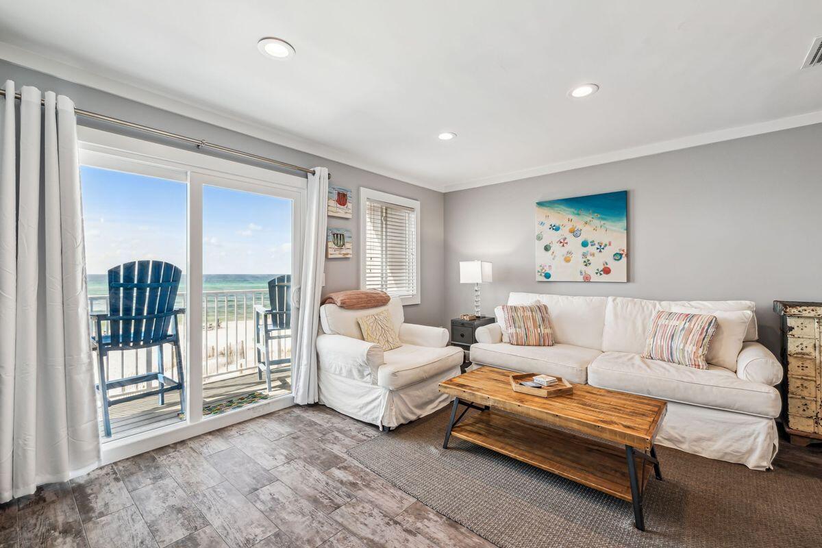 Experience the best of Gulf-front living at 627 Eastern Lake Road #5, a beautifully renovated beachfront retreat tucked away in the intimate Leeward II complex along Scenic Highway 30A. Perfectly positioned directly on the sugar-white sands of Seagrove Beach, this second-floor one-bedroom, one-bath condominium offers panoramic Gulf views, exceptional rental performance, and the laid-back luxury that defines the 30A lifestyle.

Thoughtfully updated with coastal-inspired finishes and modern conveniences, the residence features an open-concept living space designed to maximize both comfort and functionality. The spacious primary bedroom is complemented by built-in hallway bunks and a sleeper sofa, allowing the unit to comfortably accommodate guests while maximizing rental appeal. The updated kitchen features stainless steel appliances, custom cabinetry, and seamless flow into the dining and living areas, all centered around breathtaking water views.

Step outside onto your private Gulf-front balcony and enjoy morning coffee with the sound of the waves or unwind after a day on the beach with unforgettable sunset views over the emerald waters. With direct beach access just steps away, this property offers the rare opportunity to own a true beachfront getaway in one of 30A's most desirable locations.

Leeward II is a boutique nine-unit complex known for its quiet atmosphere, low-density setting, and prime location near Eastern Lake. Owners and guests enjoy easy access to nearby favorites including Seaside, WaterColor, Alys Beach, Rosemary Beach, Deer Lake State Park, boutique shopping, award-winning dining, bike paths, and countless outdoor activities along Scenic 30A.

In addition to its lifestyle appeal, the property has demonstrated strong and consistent rental performance with gross rental income of $67,331 in 2024 and $65,393 in 2025, making it an attractive opportunity for both investors and personal use buyers seeking proven income potential.

Whether you are searching for a turnkey beachfront investment, a private coastal retreat, or both, 627 Eastern Lake Road #5 offers an exceptional opportunity to own Gulf-front property in the heart of Seagrove Beach.