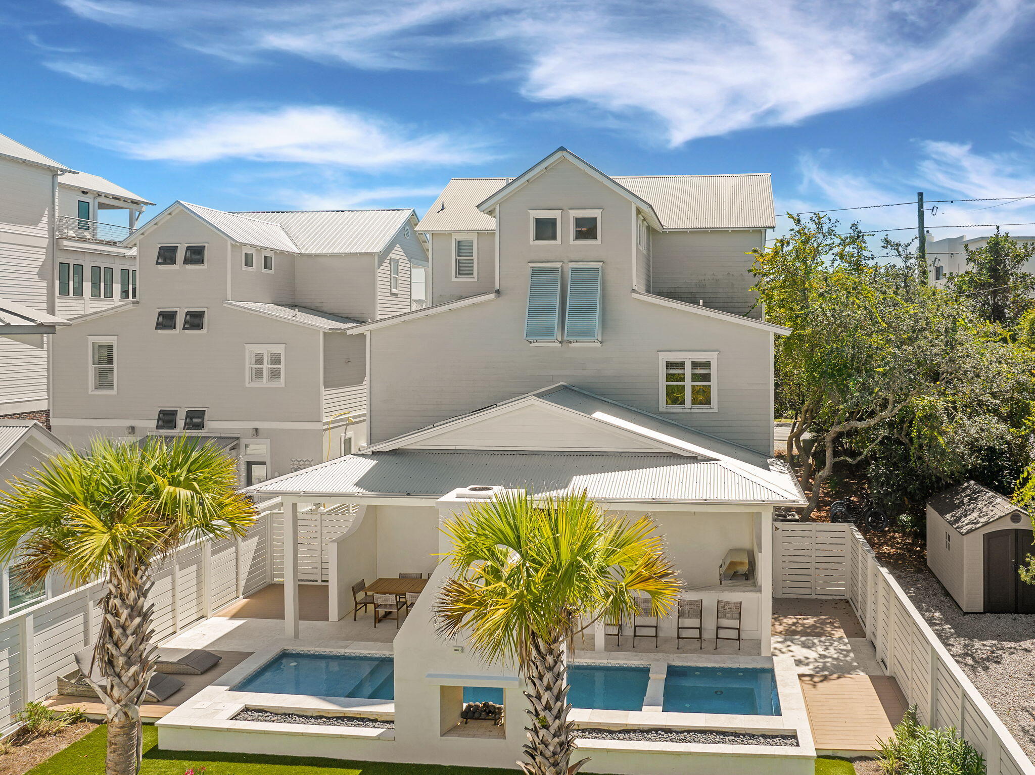 An exceptional opportunity to own a luxury 30A Gulf-view home with dedicated beach access, strong rental income potential up to $275K annually, and walkability to Seaside in one of Emerald Coast's most sought-after destinations. Ideally positioned along Scenic Highway 30A, this turnkey property is offered fully furnished with future bookings in place, making it a seamless investment and lifestyle purchase.
Located just one mile from Seaside, the home sits within a high-demand rental corridor known for consistent occupancy and long-term value. A pedestrian pathway leads directly across the street to a private beach easement exclusive to Gulf Shore Manor, offering easy access to the sugar-white sands and emerald waters of the Gulf.
Set on a spacious corner lot, this six-bedroom home is thoughtfully designed to accommodate large groups while maintaining comfort and style. Flexible sleeping arrangements, including custom built-in bunks, make it ideal for both personal use and maximizing rental performance. Recent upgrades have elevated the property, highlighted by a newly designed backyard oasis featuring a resort-style pool and spa, covered outdoor kitchen, and bar. This private outdoor space is perfect for entertaining and enhances the overall guest experience, adding significant value for both owners and renters. This is a rare chance to own a high-performing luxury beach home on 30A that delivers both lifestyle and income. Schedule your private showing today.