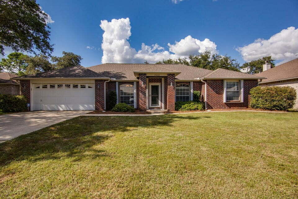 Water access just steps from the backyard! Outlined by the picturesque charm of Navarre, Florida, this stunning three-bedroom rental at 7822 Lola Cir is a true gem waiting for you to call it home. Step inside to discover a spacious 2171 square feet of beautifully designed living space that seamlessly blends comfort and sophistication. The heart of the home features elegant granite countertops, providing a perfect backdrop for culinary creativity and memorable gatherings. Cozy up by the inviting fireplace, creating a warm ambiance for relaxing evenings or festive celebrations. With two full baths, mornings are a breeze, offering everyone their own space for a refreshing start to the day. The thoughtfully designed layout ensures each room is bathed in natural light, enhancing the home's welcoming atmosphere. Located in the serene community of Navarre, you'll enjoy a perfect balance of tranquility and convenience, with local amenities just a short drive away. Owner will allow pets (ANY size dog), $350 non-refundable pet fee per pet and $10 per month/pet rent. This home is just minutes from shopping, dining, local schools, and a short drive to the beautiful Gulf Coast beaches. All Coastal Realty Services residents are enrolled in the Resident Benefits Package (RBP) which includes renters' insurance, HVAC air filter delivery (for applicable properties) and our best-in-class resident rewards program, and much more! More details upon application.