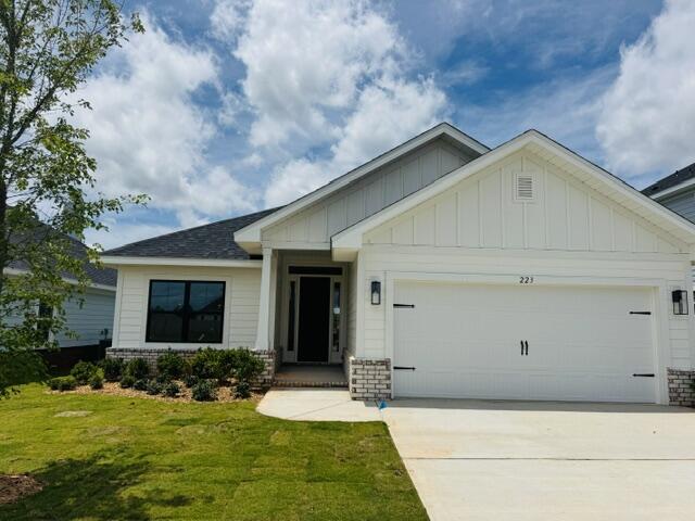Just 20 minutes from the sugar-white sands of South Walton and scenic 30A, this sought-after Craftsman-style 4-bedroom, 2-bath home offers the perfect blend of coastal convenience and everyday comfort. Ideally positioned directly across from the community pool and cabana, the home is designed for easy living and entertaining. Upgraded luxury vinyl plank flooring flows throughout, while the main living area features a dramatic cathedral ceiling and 9'+ ceiling heights that create an open, airy feel. Eight-foot entry doors and quartz countertops add refined style throughout. The spacious owner's suite includes a generous walk-in closet, providing a peaceful private retreat. Furnished photos are of a similar home. Adams Homes pays most closing costs!