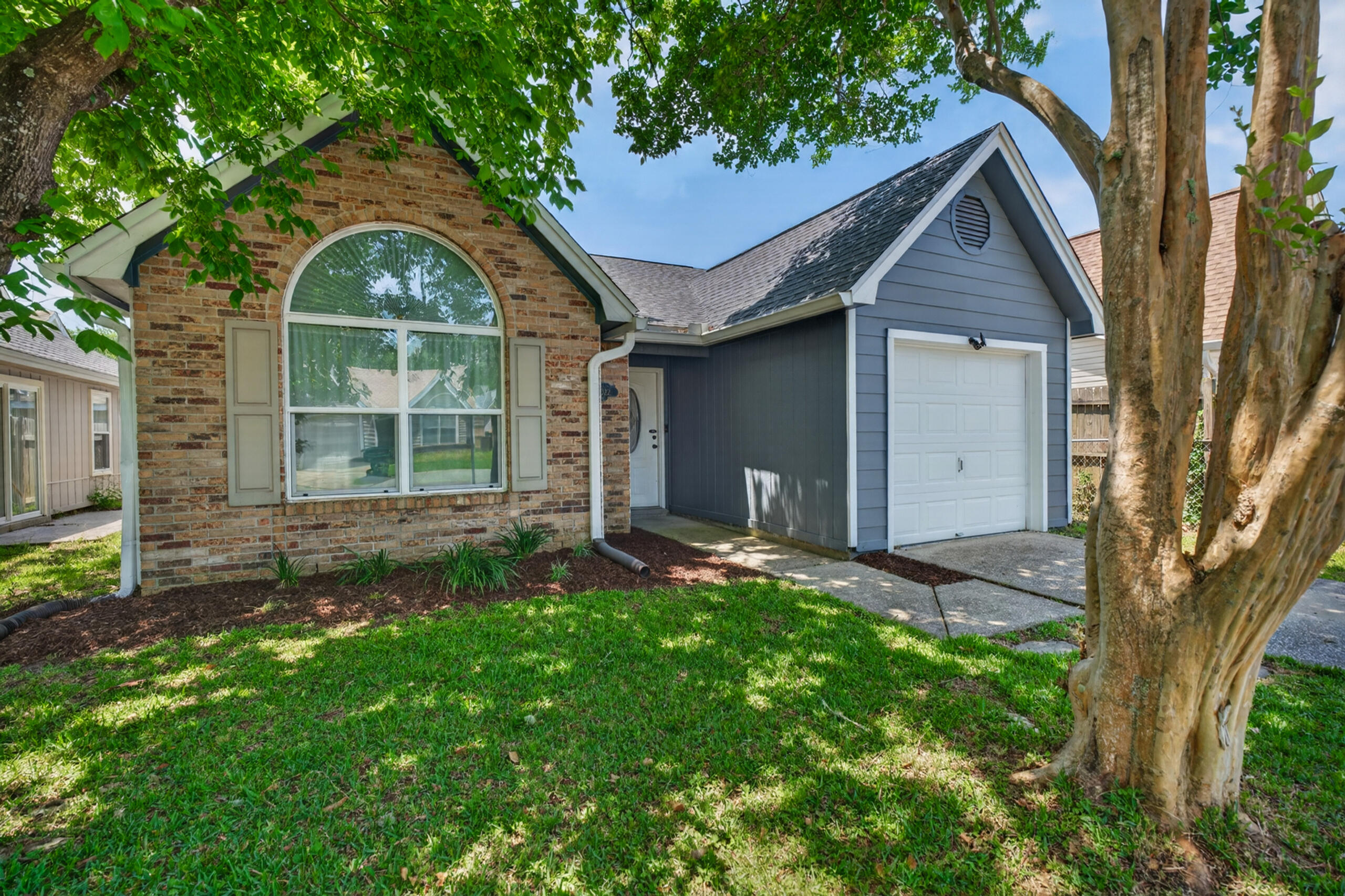 Discover modern comfort and style in this beautifully renovated single-family home, ideally located in Fort Walton Beach. Thoughtfully updated from top to bottom, this move-in ready property features brand-new flooring throughout, stunning quartz countertops, and new appliances that blend function with design. Enjoy fresh interior paint, updated fixtures, and upgraded bathroom vanities that bring a polished, contemporary look to each space. The primary suite offers a luxurious stone tile shower, providing a spa-like retreat at home. Additional upgrades include epoxy-coated garage floors for durability and a clean finish, as well as a new roof, HVAC system, and water heater—all replaced in 2023, offering peace of mind and long-term value.