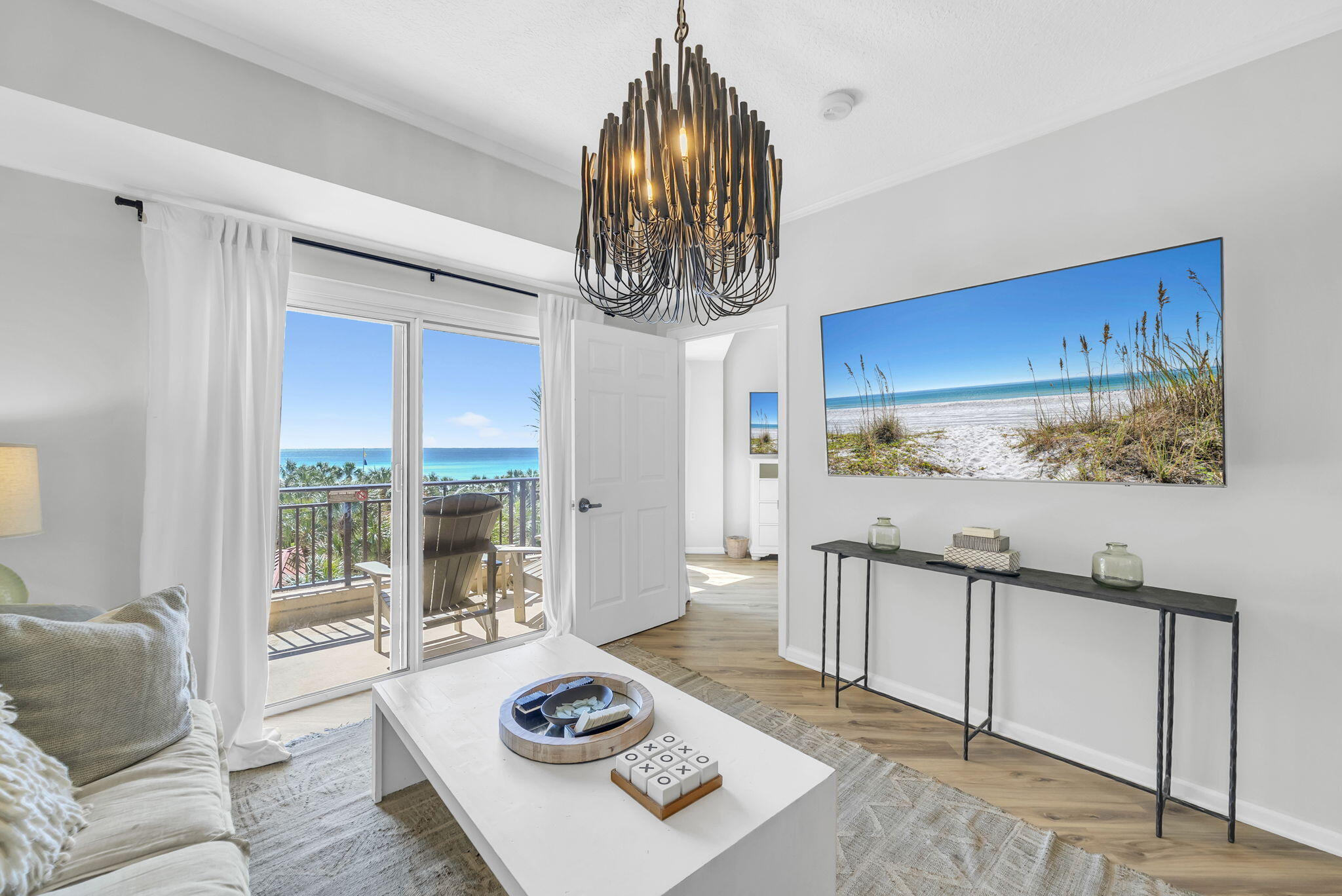 GENERATING 30% MORE INCOME THAN OTHER UNITS WITH $81,508 ACTUAL 2024 RENTAL INCOME, ENJOY IMMEDIATE CASH FLOW! Smart money chases the highest return, NOT the highest view.   Own a property that works for you from day one.  Ideally located on the 3rd Floor, enjoy the convenience of skipping elevators & stepping right into your beach getaway.  Its beautiful, professionally decorated interior is designed for comfort & functionality. Blending luxury living w/PROVEN rental performance, this fantastic condo offers you the Coastal lifestyle you've dreamed of.  Start your day w/a walk on the beach, work out at the fitness center & then head out for a pickle ball match just moments away.  Unwind w/a sunset cocktail on your private balcony overlooking the turquoise waves, and cap it off w/dinner at Baytowne Wharf.   A palette of coastal pale blues that perfectly compliment your Gulf vistas beyond, you'll be captivated by the thoughtful renovations w/LVP flooring throughout, and a beautiful, white kitchen w/quartz counters, large eating bar & NEW SS appliances.   A distinctive, tiled backsplash elevates the space.  The master suite, in calming shades of blue, provides a tranquil setting and Gulf views from its private balcony.  An elegant white, wood trimmed wall accents the spacious, 2nd bedroom.

Whether a primary residence, 2nd beach home or short-term rental property, begin enjoying your coastal retreat IMMEDIATELY, as the turn-key professional interior design extends throughout every room creating cohesive, luxurious spaces. In addition to the caged storage area in the underground parking lot, this unit also has a 2ND STORAGE UNIT located in the hall near the front door.

Located within the renowned Sandestin Resort, the private beach, Gulf side pool, kiddie pool, spa and fitness center are a short walk or golf cart ride away. Gulf enthusiasts will appreciate the proximity to world-class courses, while tennis & pickle ball players can perfect their game on courts nearby.  

The legendary Baytowne Wharf, with its charming attractions, restaurants & special events lies just a short golf cart ride away.  This pedestrian-friendly village creates a sense of community while offering entertainment options for all ages, from family-friendly festivals to sophisticated evening dining experiences. 

Publix super market at Grand Boulevard ensures that grocery shopping remains effortless, while Grand Boulevard's fantastic restaurants & boutique shops offer endless opportunities for dining and retail therapy. 

Providing peace of mind to owners regarding structural integrity & safety standards, Westwinds has successfully passed the milestone & SIRS inspections and recently replaced all 4 elevators.  In addition, the complex maintains strong reserves for any future projects.

This exquisite property embodies a lifestyle choice that prioritizes both luxury and financial prudence. Its combination of: ideal 3rd floor location w/elevated Gulf & foliage views without the long elevator wait, stunning interior, 4-seat golf cart WITH dedicated golf cart parking spot, PROVEN 30% HIGHER RENTAL HISTORY THAN OTHER UNITS, and access to world class amenities provides the perfect foundation for your coastal dreams.

Enjoy the Sandestin coastal lifestyle at its finest--vibrant, effortless & unforgettable.