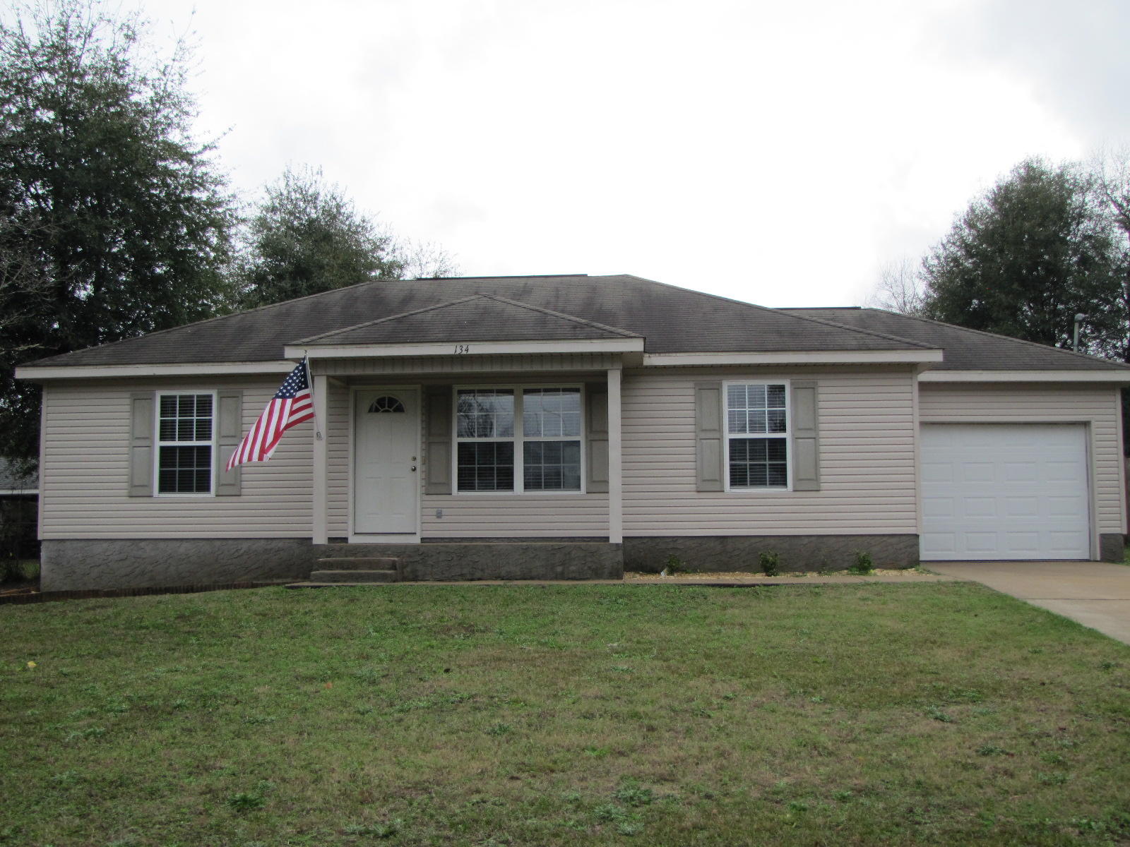 This home is available for immediate move-in. The home has a split bedroom design, vaulted ceiling in the living room,newer carpet, inside laundry room, and single garage.  Most rooms are painted in a neutral color to match any decor. The owner will allow pet with breed restriction and pet fee.