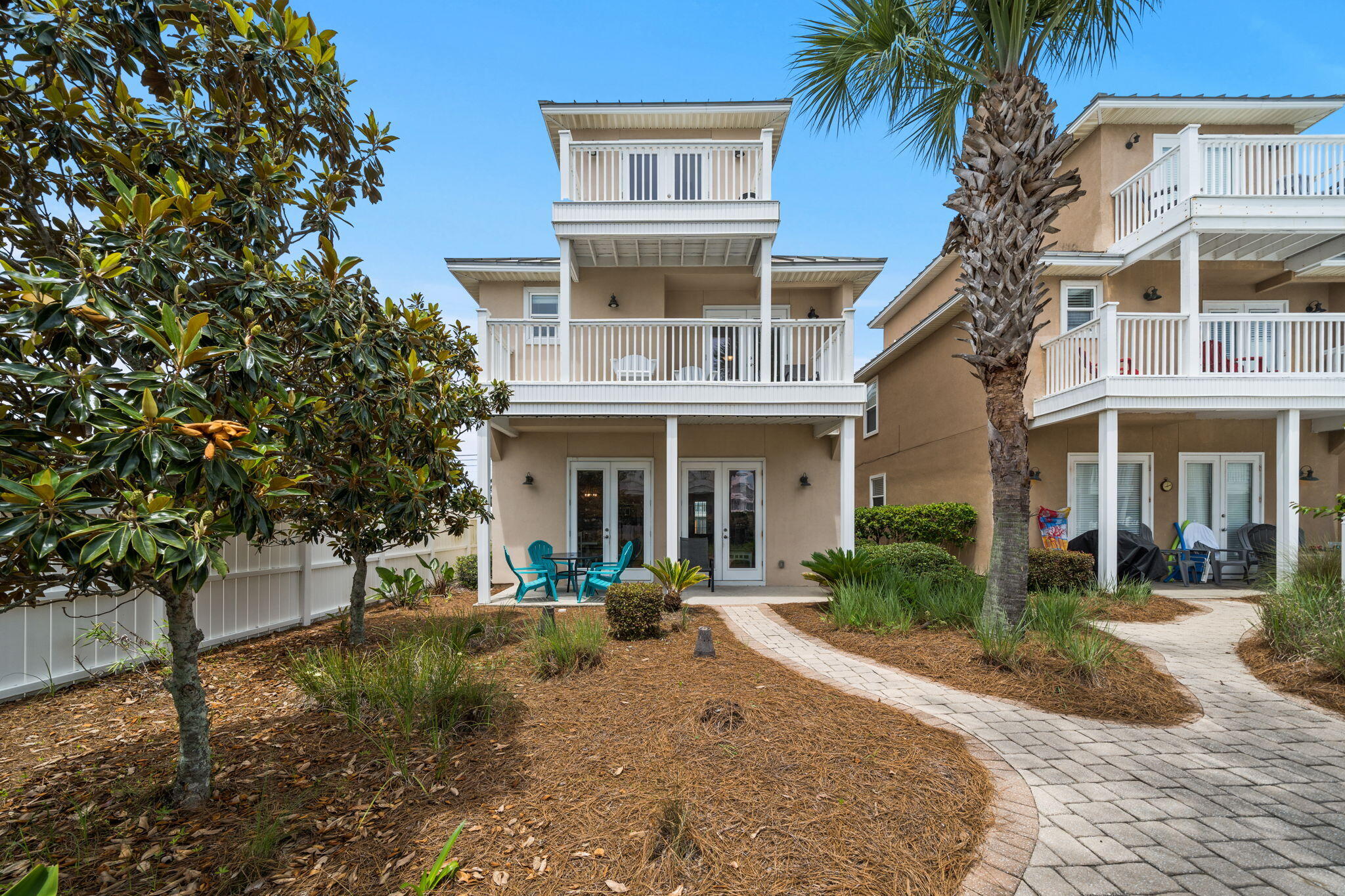 Welcome to your next premier short-term rental investment on the World's Most Beautiful Beach! This spacious 4-bedroom, 3.5-bath single-family home is perfectly positioned to maximize rental income and guest satisfaction -- offering the ideal blend of comfort, location, and unbeatable coastal lifestyle. Inside, you'll find two luxurious master suites, including one with peek-a-boo Gulf views, plus a large bunk room that sleeps a crowd -- making it a favorite for family vacations and large groups. With 3.5 bathrooms and a thoughtful layout, guests enjoy the space and privacy that keeps them coming back and leaving five-star reviews. Step outside and the fun begins immediately. Walk to the beach where guests can rent chairs, hop on a jet ski, or soar above the emerald waters on a parasailing adventure -- all right at the shoreline. Cool off in the community pool or spend the day exploring everything PCB has to offer: St. Andrews State Park, multiple boat launches, Shipwreck Island Waterpark, arcades, go-kart tracks, mini golf, amusement rides, pontoon and golf cart rentals, and the iconic Pier Park. Foodies and night owls will love the proximity to local favorite restaurants, Top Golf, Dolly Parton's Dinner Theatre, and a vibrant nightlife scene. And the best is still coming -- the highly anticipated PCB Surf Club is on the horizon, adding even more draw for future guests and long-term appreciation to this already red-hot market. Whether you're looking for a turnkey vacation re ntal, a family beach retreat that pays for itself, or a savvy investment in one of Florida's most sought-after destinations -- 7827 Beach Dr delivers it all. Don't miss your chance to own a piece of paradise where the Gulf never gets old and the bookings never stop.