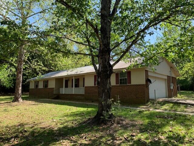 This 3 Bedroom 2 Bath home sits on 2 Acres.  The interior walls, kitchen and bathroom cabinets were freshly painted just over a year ago.  Newer Vinyl Plank Flooring, New Carpet in all Bedrooms, Fireplace, Detached Apartment is not included for tenant use. Applications can be completed on line at rentcafe.com