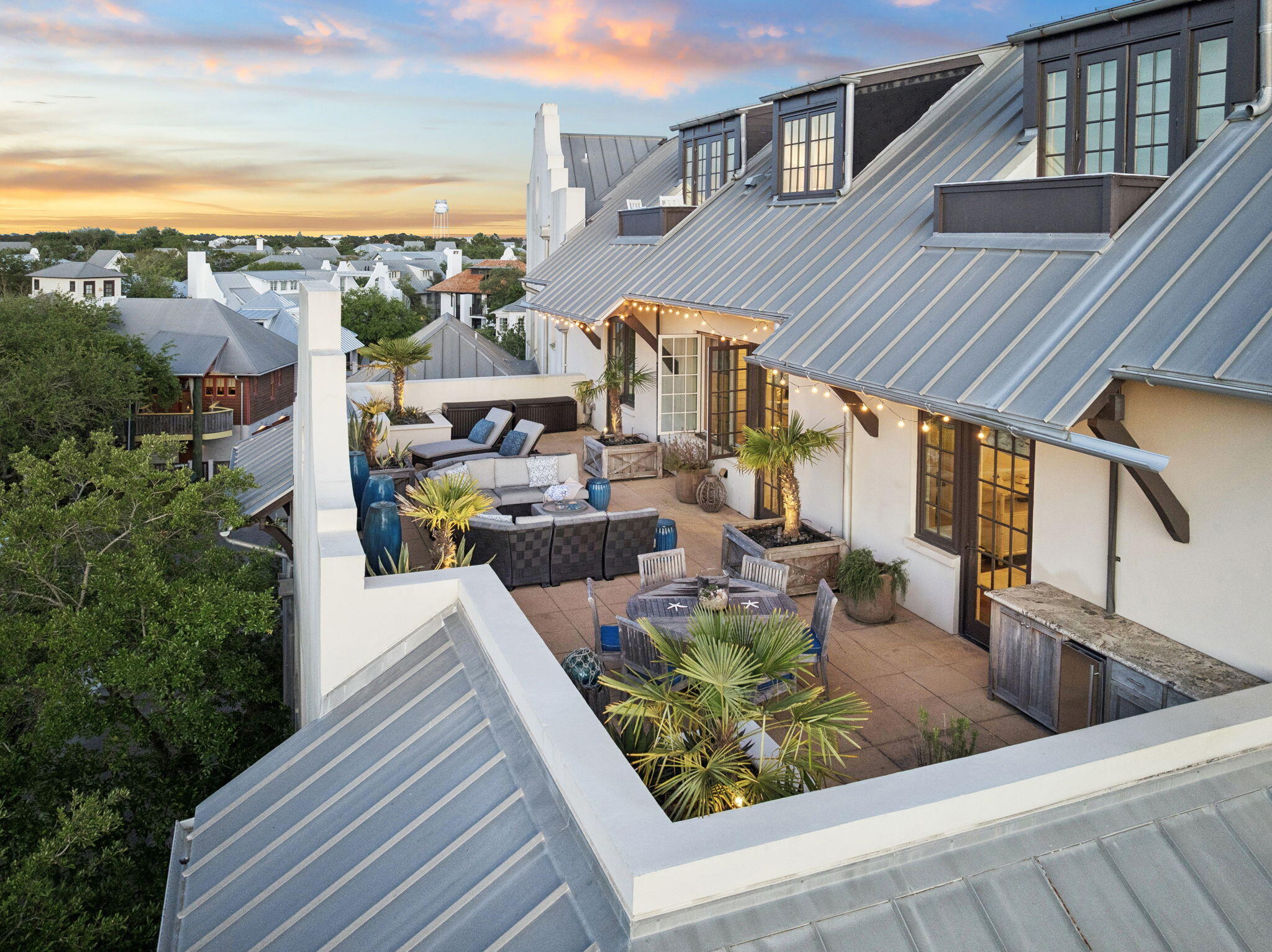 This 3-bedroom, 2-bath condo offers a rare blend of indoor comfort and standout outdoor living in the heart of Rosemary Beach's Town Center. Upon entry, the expansive 875 sq ft private terrace immediately sets the tone--ideal for relaxing, dining, or entertaining--with the unique advantage of capturing both sunrise and sunset views, a truly special feature in this setting.

Inside, the open living, dining, and kitchen areas feature wood flooring and a well-appointed kitchen with Viking appliances, including a gas range, stone countertops, and generous storage. The primary suite includes a private en-suite bath and direct access to the terrace, creating a seamless indoor-outdoor connection. Two additional bedrooms share a spacious bath.

Additional highlights include underground parking with a dedicated space and a private storage cage for bikes and beach gear. Located just steps from Town Center shops and restaurants, with easy access to the private community beach, four community pools, and the Owners' Pool and Pavilion.

A strong performer as a vacation rental, this property combines location, layout, and exceptional outdoor space to appeal to both owners and guests.