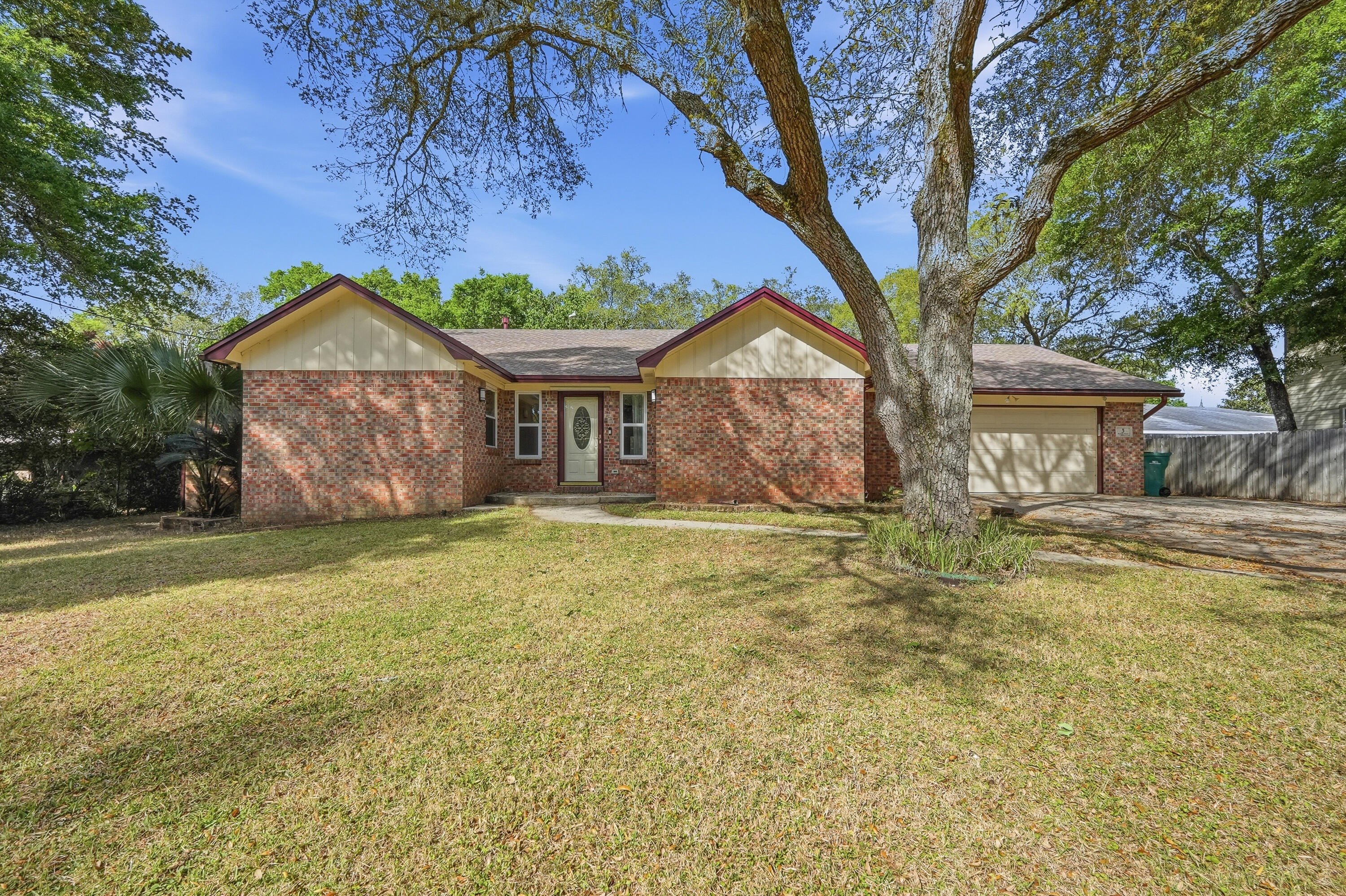 BRAND NEW FLOORING THROUGHOUT! Tucked away on a quiet cul-de-sac in the desirable Kenwood District, this spacious, well-maintained brick home offers comfort and versatility. Situated on a large fenced lot, the property includes two powered sheds-perfect for storage, hobbies, or a workshop. The split floor plan provides privacy for the primary suite with direct backyard access, while the updated guest wing and bonus flex room offer space for visitors, a home office, gym, or additional living. Features include a 2-car garage, full-house generator, and updated kitchen appliances. Major updates: brand new LVP flooring throughout the living areas and master suite (2026), HVAC (2017), roof (2013), tankless water heater (2019), generator (2012). Enjoy outdoor living with plenty of room to entertain, garden, or relax. A great opportunity to add your personal touch!