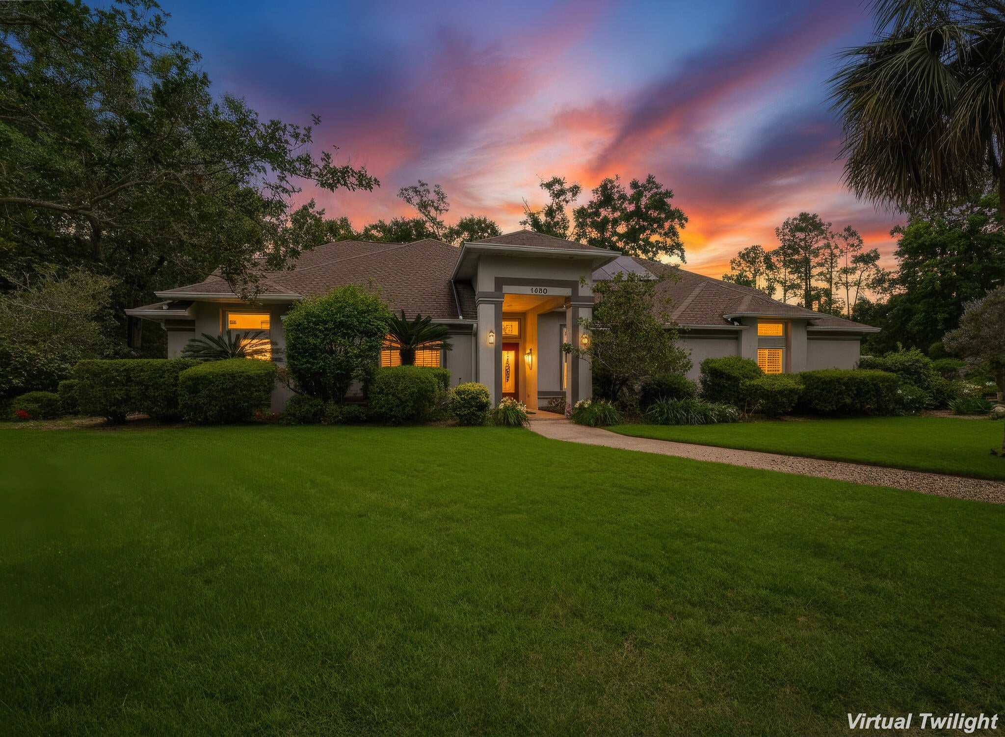 Welcome to 1400 Kings Road, a unique 4-bedroom, 3.5-bath home offering approximately 3,542 square feet of living space on a beautifully landscaped 0.72-acre lot. Designed for both everyday living and entertaining, this home features a spacious Florida room with an additional full kitchen, providing endless possibilities for hosting guests, multi-generational living, hobbies, or recreation. Step outside to your private backyard retreat featuring an in-ground pool, hot tub, and screened enclosure with new screening installed in 2025. A large deck within the enclosure offers ample space to create the ultimate outdoor entertainment area. The park-like grounds showcase a tranquil koi pond with a bridge, waterfall, and grotto, along with a pergola and multiple peaceful spaces to garden, relax, and enjoy the outdoors. Additional features include a whole-home generator, tankless water heater, and solar panels. This one-of-a-kind property combines privacy, character, and exceptional outdoor amenities in a convenient Pensacola location.