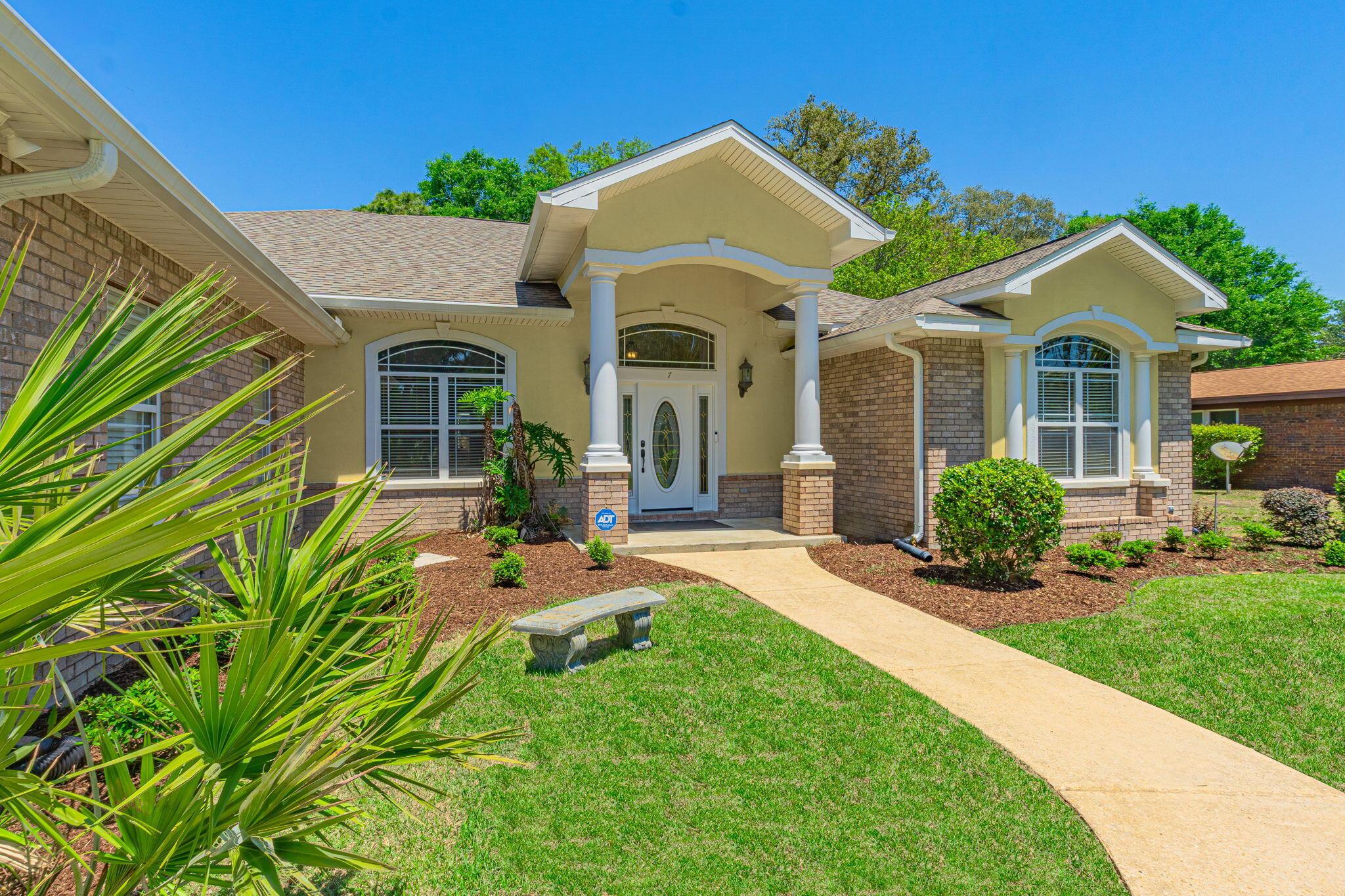 Move-in ready and better than new, this beautifully updated home offers the ideal blend of comfort, convenience, and coastal lifestyle. Located within walking distance to the beach and boat launch, the property is perfectly positioned for enjoying the best of the area while providing a private retreat at home.. Inside, the home features 4 spacious bedrooms, with an additional 1-bedroom, 1-bath cabana connected on the lanai--ideal for guests, extended family, or a private home office setup. Thoughtfully updated throughout, the home has been newly painted and includes new carpet, giving it a fresh, inviting feel from the moment you enter . Designed for both everyday living and entertaining, the kitchen is equipped with a double oven and the home includes 2 tankless hot water heaters for added efficiency and convenience. All major systems have been replaced within the last 5 years, offering peace of mind and making this home truly turnkey.

Step outside to enjoy the screened-enclosed pool area, perfect for relaxing or hosting gatherings year-round. A semi-circular driveway adds curb appeal and practicality, completing this exceptional property.