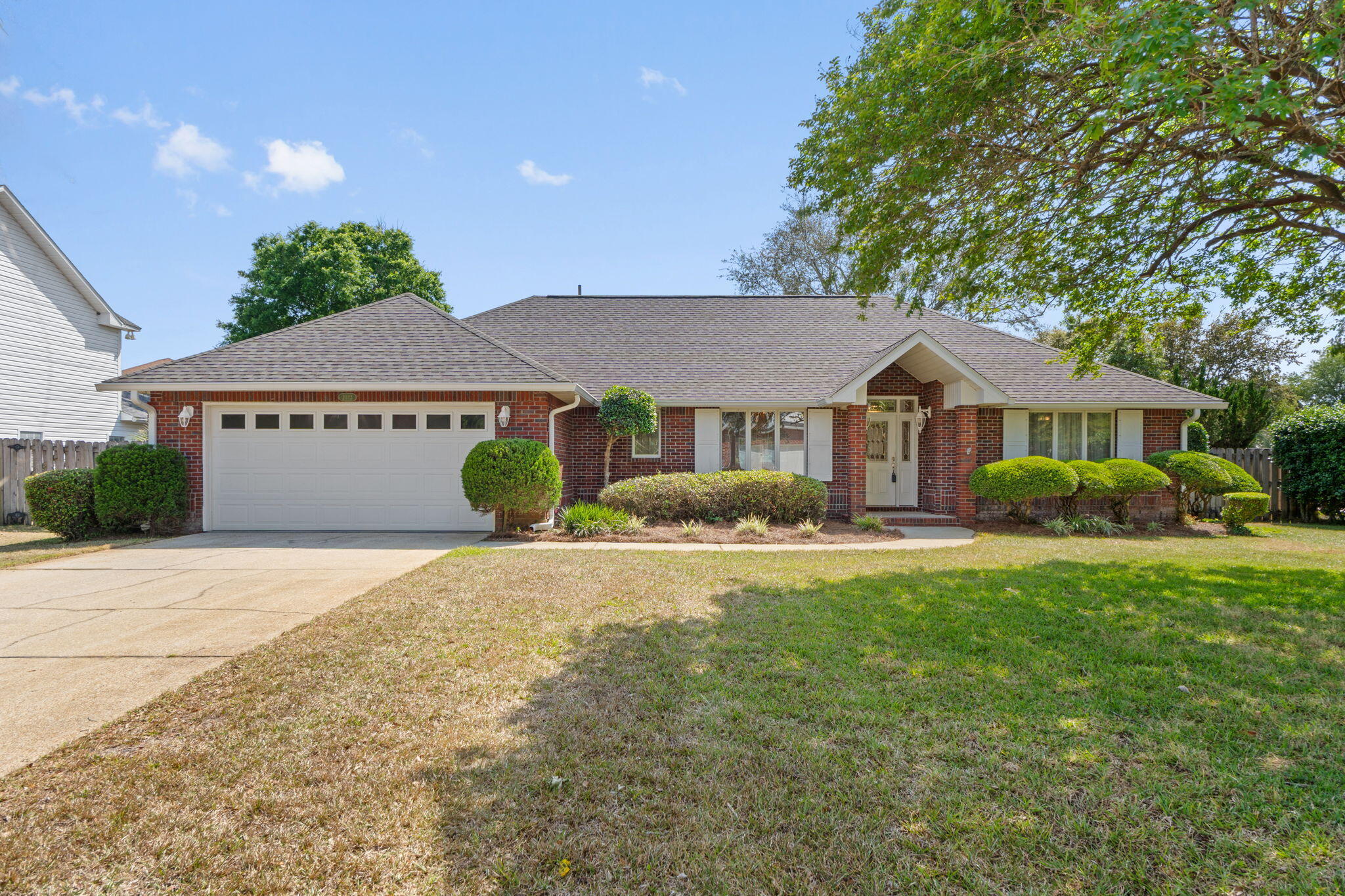 Welcome to this well maintained pool home in the Tiger Point Community. This open bright and airy 3 bedroom, 2 bathroom split floor plan is turnkey and ready for the next family. No carpet in any rooms. Travertine tile floors are through the main living areas and laminate flooring in the bedrooms. Kitchen has stainless appliances, tile backsplash and plenty of room to prep your meals all while overlooking the beautiful outdoor pool space through the plentiful windows and natural light that come from the breakfast nook area. Large master with French doors that also lead out to the pool area. Wide open living room with gas fireplace that opens up into the sunroom that is also heated and cooled through the central HVAC system with ductwork. This sun room is surrounded by endless windows and light that overlook that backyard and pool area. Roof 2022, HVAC 2025, HWH 2024. Come check out your new home and see what Tiger Point Golf Community has to offer! This is a waterfront community with many communities within the community itself and is golf cart friendly as well as bike friendly. Tiger Point Golf Club and The Pointe restaurant and its many bars are on the East side of the community and the neighborhood also backs up to Tiger Point Park and community center where there are year round sports and fields and large playground along with tennis and basketball courts to enjoy! Publix, Walmart and Lowes and plenty of restaurants and businesses also right next to Tiger Point Park. Multiple access points to enter Highway 98 and easy to get to I-10 via Avalon Rd. Did I mention 20 minutes to either Pensacola Beach or Navarre Beach? Opportunity is calling you!