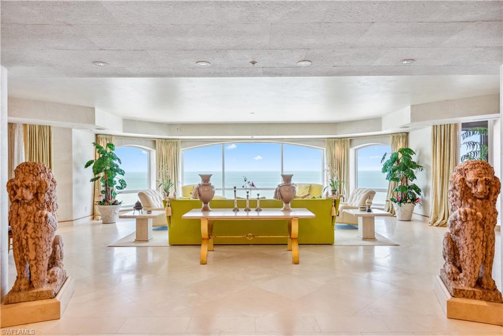 Rare opportunity: only two penthouses have sold at The Windsor in the last seven years, the last in 2023. Full-floor Penthouse 17 in the highly regarded Windsor at Bay Colony high-rise. Two high-speed, secured elevators open directly into the residence, which spans the entire 17th floor with 8,550 sq. ft. under air and more than 1,500 sq. ft. of expansive private lanais and terraces. Enjoy 180° panoramic views of the Gulf of Mexico and the beach. Four bedrooms, five full baths, and two half baths, including a huge primary wing with his and hers closets and baths. Additional spaces include a huge kitchen with a morning kitchen and wet bar, an exercise room, an office, and a den/library, all finished with solid burl wood interior doors. The residence includes a private garage and a private pool cabana. Residents also enjoy the Bay Colony Beach Club next door. Newly transformed, The Windsor delivers amenities designed to elevate every aspect of daily life. A 24-hour concierge desk is always at your service, while the resort-style pool, state-of-the-art fitness center, and elegant social lounge invite you to relax and connect.   Offered unfurnished. We anticipate the next owner will want to do some renovation work, and the residence is priced accordingly. Private showings by appointment