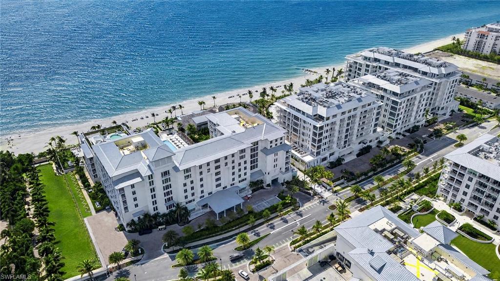 The iconic Naples Beach Club enters a new era with the completion of Four Seasons Residences, an exclusive beachfront enclave redefining luxury living on the Paradise Coast. Originally established by the Watkins family in 1946, this historic destination has been thoughtfully transformed into one of Florida's most coveted residential addresses. This beautifully appointed three bedroom plus study, three and a half bath residence offers extraordinary craftsmanship and effortless elegance, highlighted by soaring 12-foot ceilings, sunlit interiors, a palatial, one of a kind terrace with west-, east-, and south-facing vistas, and spectacular Gulf views. The true VIP guest suite has a private, large terrace as well. The elegant Seashell design palette features white cabinetry, Calacatta marble kitchen countertops and island, blonde white oak flooring, and luxurious Bianco Dolomiti, Nordic Gray, and Vanilla Ice marble throughout the baths. Created by renowned designer Champalimaud, the residence blends timeless architecture and finishes, premium appliances, custom millwork, generous walk-in closets, and private elevator access. Limited to just 58 residences, Four Seasons Naples Beach Club offers an unrivaled lifestyle with a Fazio designed 18-hole golf course, world-class spa and wellness,  six dining venues, Hamilton Harbour Yacht Club access, 1,000 feet of pristine beachfront, and the legendary Four Seasons service.