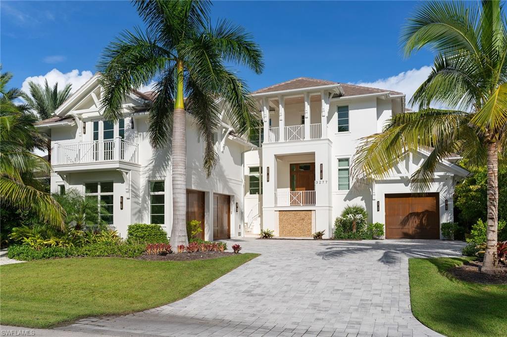 Refining the standard of coastal luxury along Naples’ most iconic boulevard, 3277 Gordon Drive is a newly constructed fully furnished architectural masterpiece designed for sophisticated living and effortless entertaining. Spanning over 6,400 square feet in prestigious Port Royal, this sprawling residence offers seven ensuite bedrooms, an expansive floor plan crafted with flawless attention to detail and a spacious three-car garage. Inside, dramatic ceiling heights and expansive living areas with the open-concept living spaces and natural light, seamless transitions lead to an exceptional outdoor oasis featuring a resort-style pool, a custom summer kitchen and an expansive covered lanai, still providing complete privacy. Uniquely positioned just moments from beach access and a short stroll to the new Port Royal Club, this estate offers associate membership to world-class dining, tennis, wellness and beachside amenities.